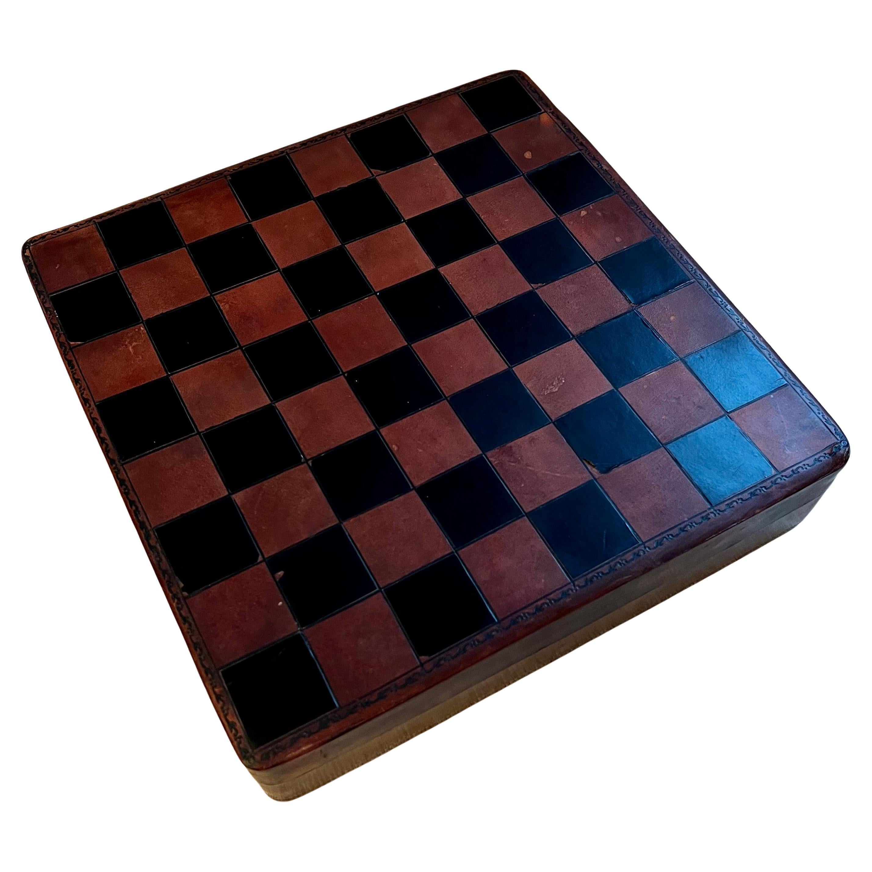 Custom Leather checker or chess box with velvet lined compartments for storage of game pieces... We have purchased and included wooden chess and checker playing pieces for the box - perfectly sized and nice to the touch.

A great travel companion,
