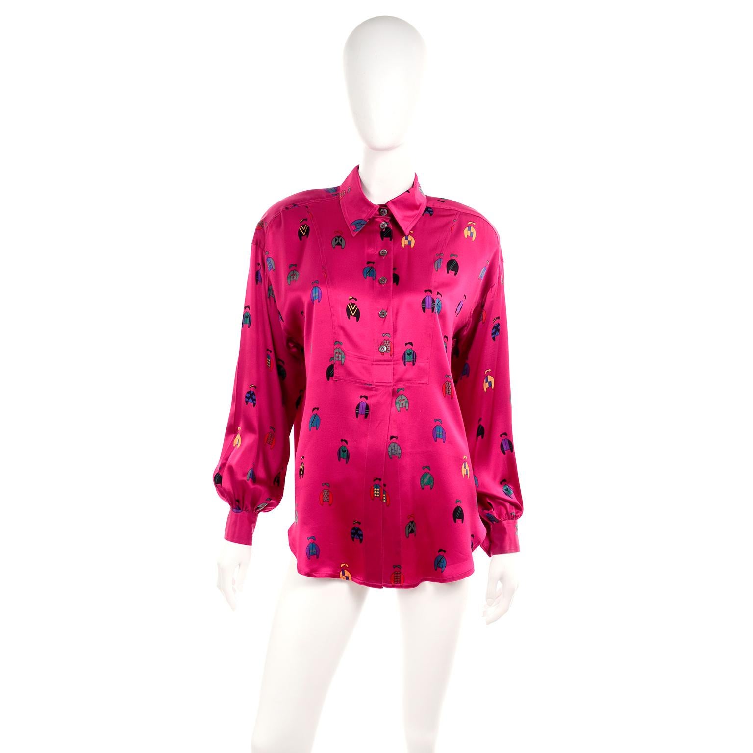 We love prints!  This lovely silk blouse was purchased at Bergdorf Goodman in the 1980's.  The blouse is 100% Silk and the rich fuchsia hot pink background is covered with jockey torsos and hats in different patterns and colors including yellow,