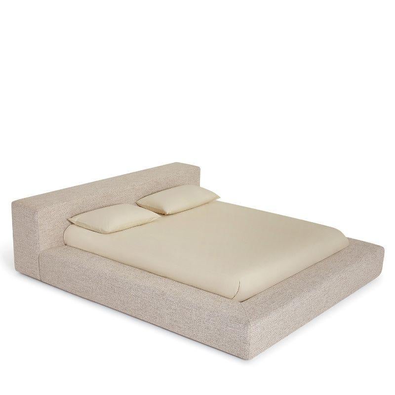 Clean and essential yet incredibly detailed, this stupendous bed will take center stage in a minimalist and contemporary bedroom. Fashioned of fir plywood and steel, it is padded with high-density polyurethane foam and upholstered with a removable