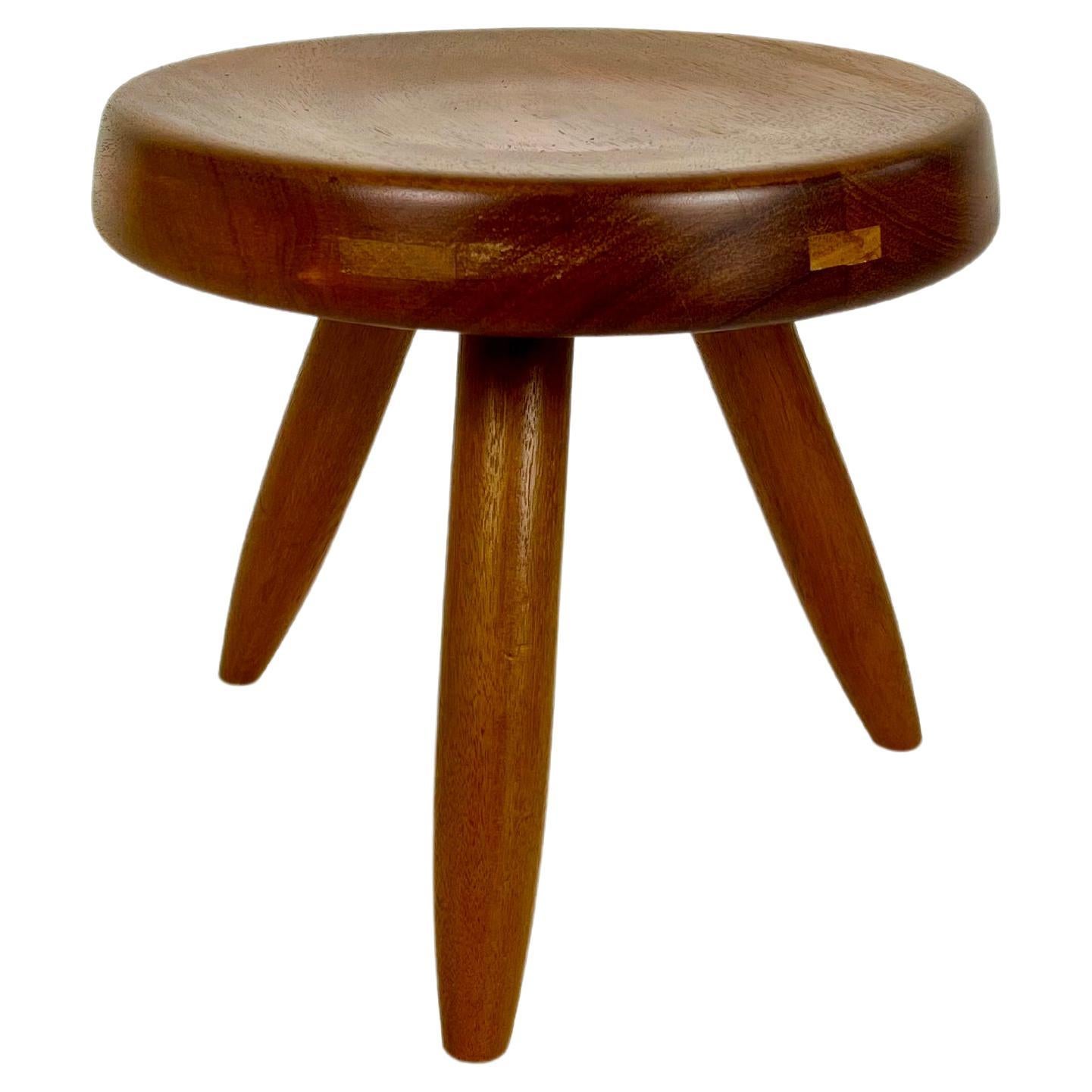 Berger low stool in mahogany, Charlotte Perriand