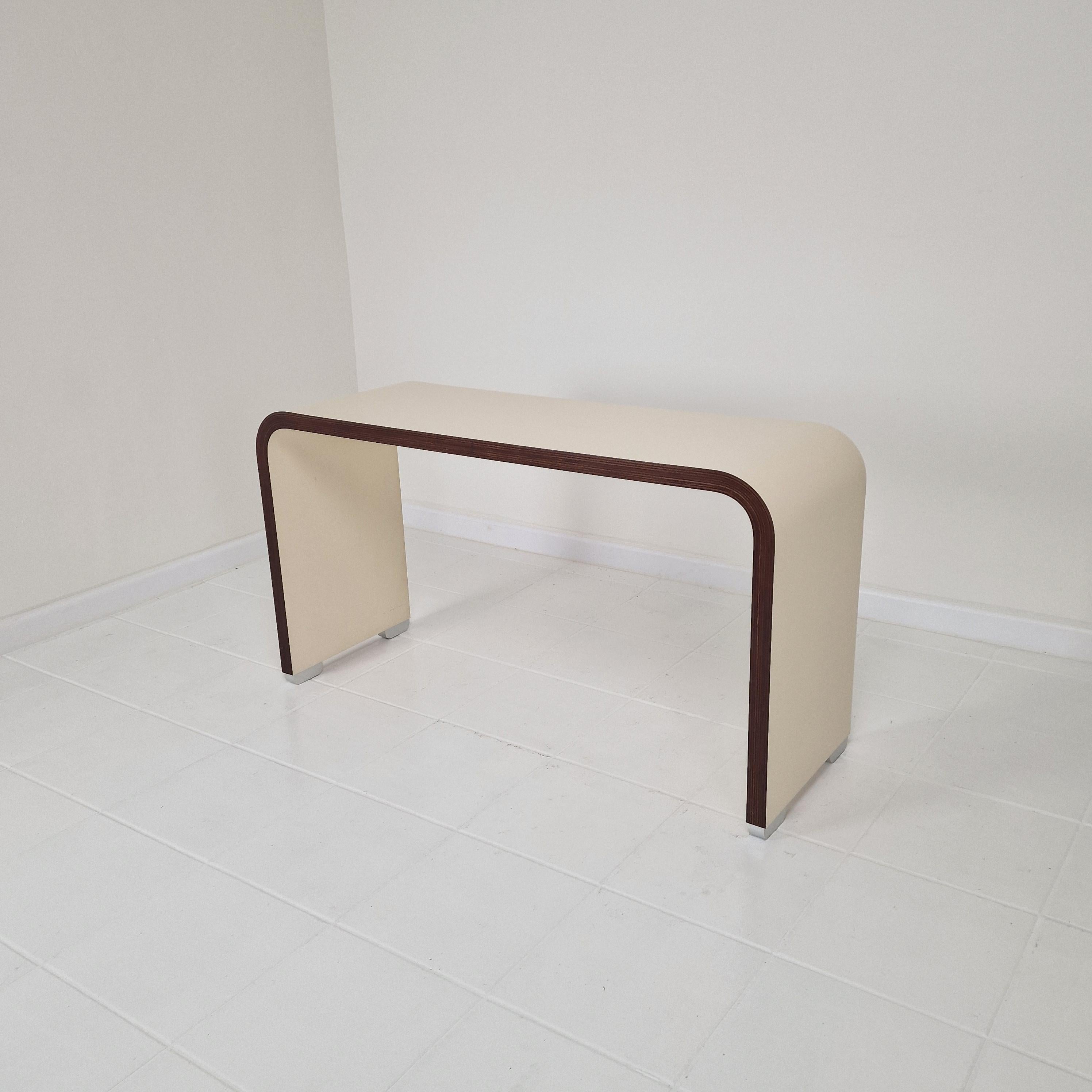 Beautiful desk or console table produced by the Belgian company Bergwood in the 1970’s. 

Bergwood is known for its productions of Jules Wabbes. 

Based on sketches that are published in the book ‘Jules Wabbes – Interior Architect’ it is not clear