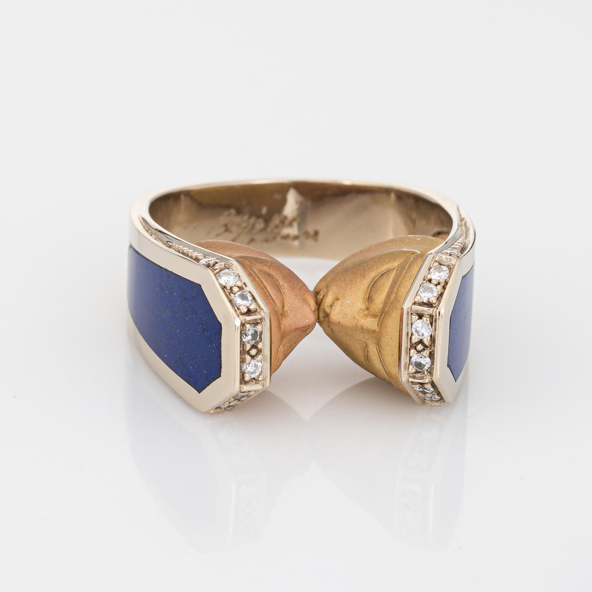 Stylish pre-owned ring by Berjo crafted in 18 karat yellow & rose gold. 

Sixteen diamonds total an estimated 0.08 carats (estimated at H-J color and SI1-I1 clarity). Lapis lazuli is inlaid into the side shoulders measuring 18mm x 6mm. The lapis is