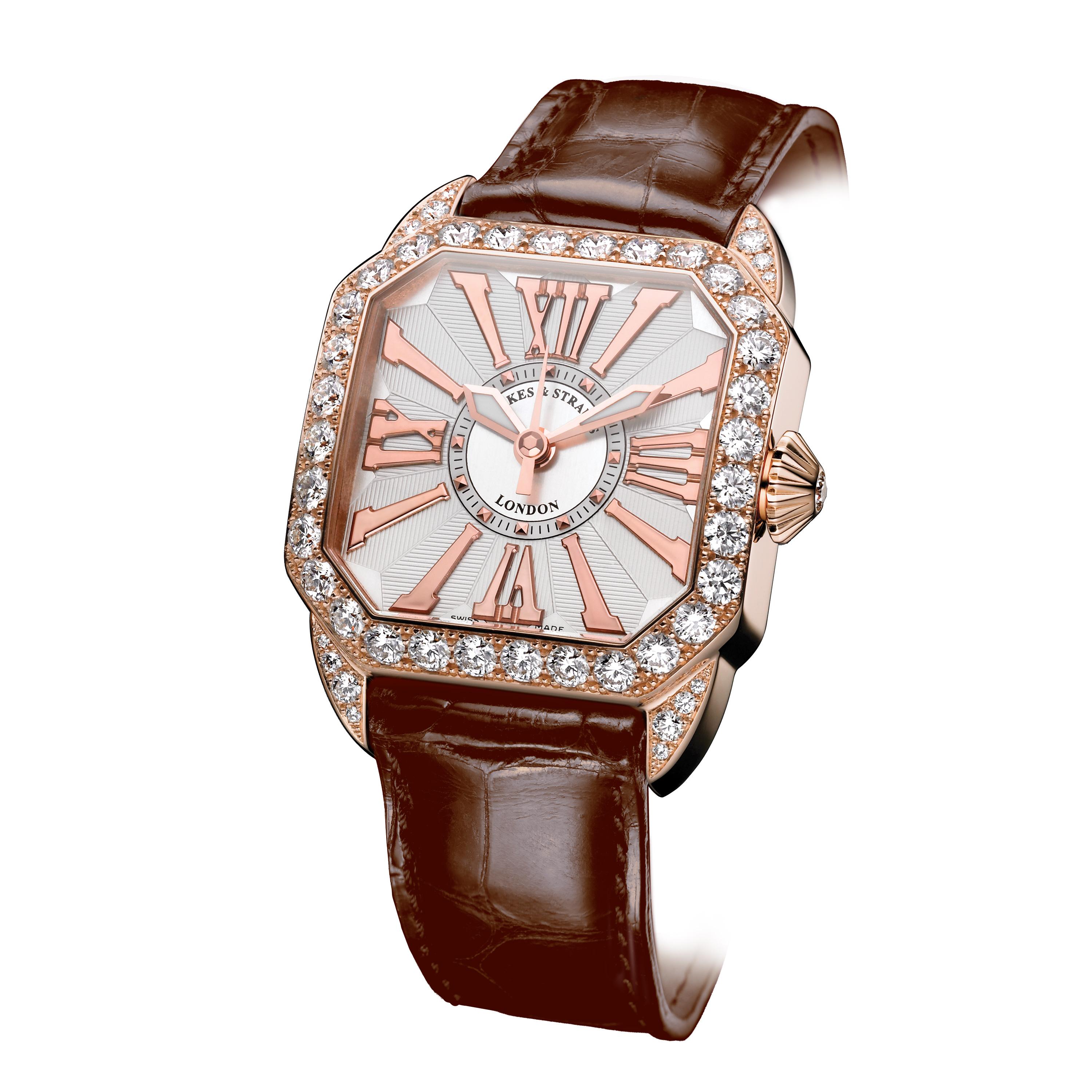 Berkeley 37 is a luxury diamond watch for men and women crafted in 18kt rose gold, featuring the white dial with rose gold Roman numerals, automatic movement. The case, buckle and crown are set with white Ideal Cut diamonds. It is a 37 mm elegant