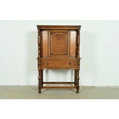 Berkey & Gay Antique English Jacobean Carved Walnut Bookcase, Circa 1920s