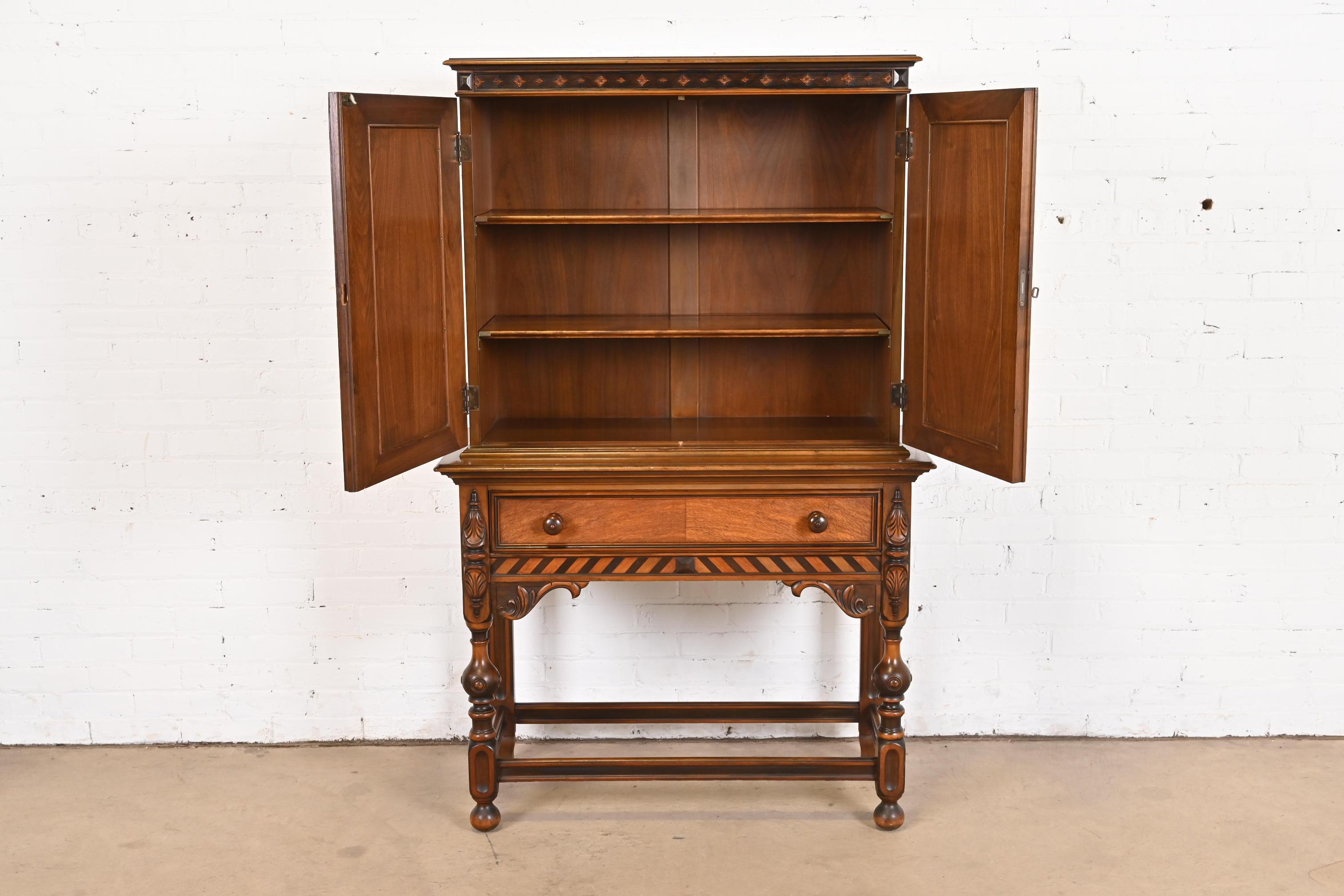 Early 20th Century Berkey & Gay English Jacobean Walnut and Burl Wood Bookcase or Bar Cabinet For Sale