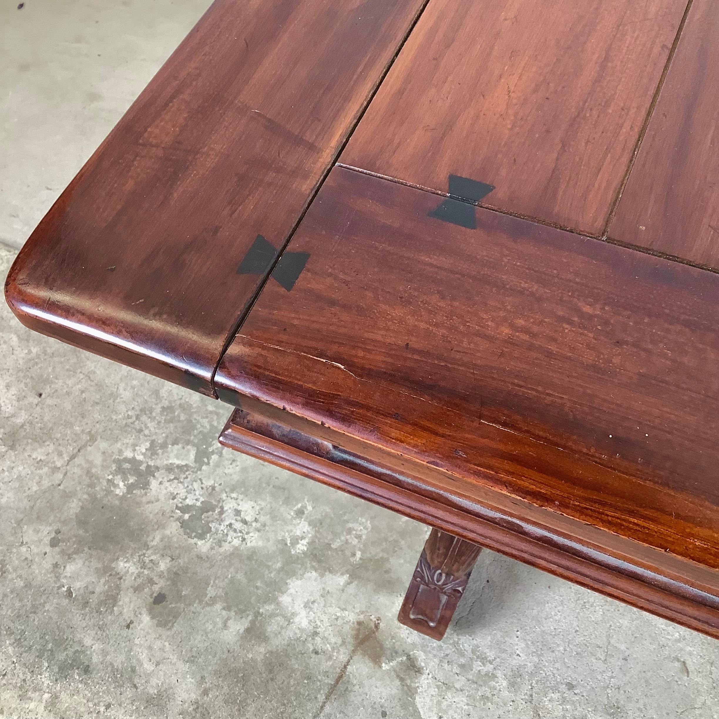 Berkey & Gay Spanish Revival Trestle Dining Table with Leaves In Good Condition For Sale In Trenton, NJ