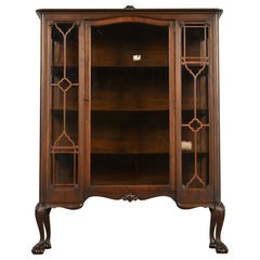 Bibliothèque de style Chippendale en acajou sculpté, de style Berkey & Gay, vers les années 1920