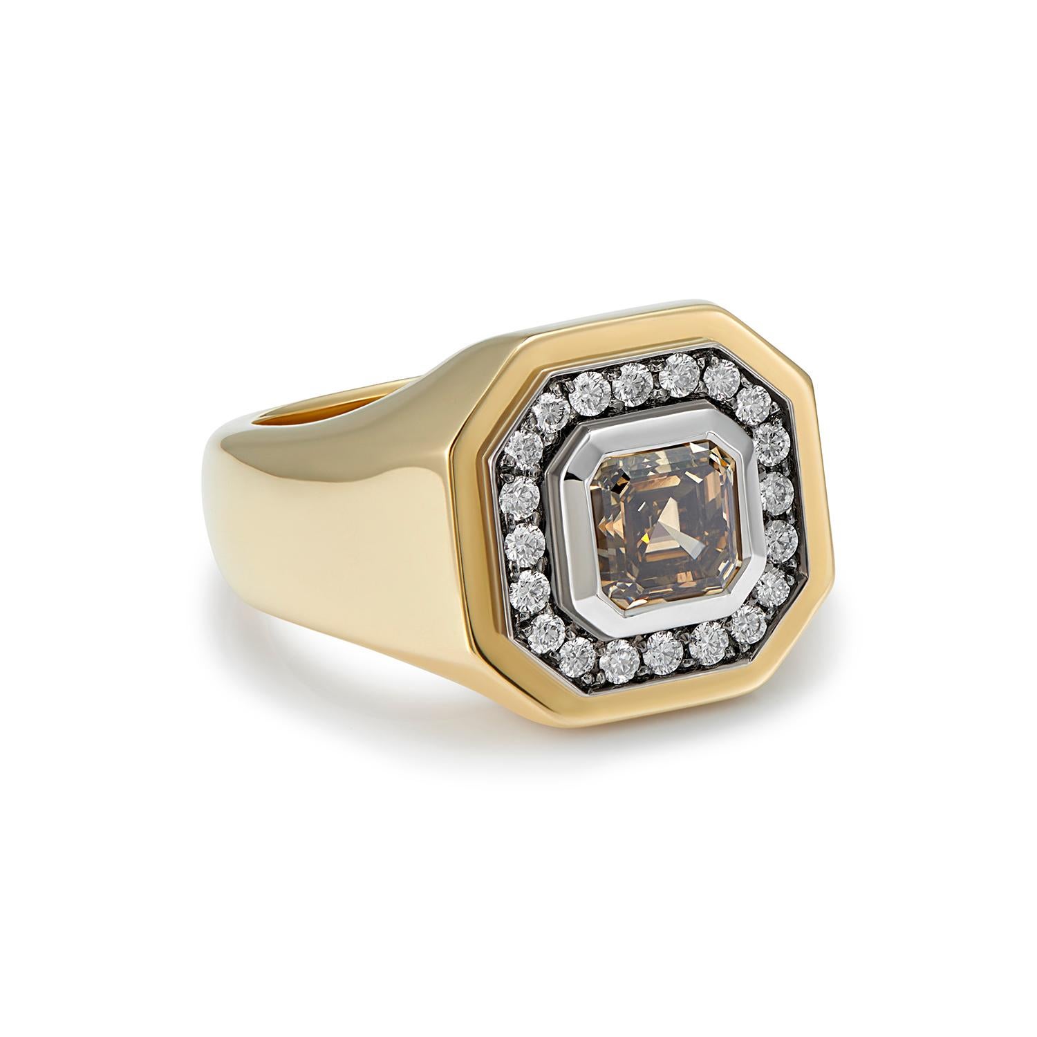 1.24ct Octagonal cut Cognac Brown Diamond
0.54ct White Diamonds
18k Yellow Gold 

A rather special ring, perfect for those wanting something a little bit different for an engagement ring.

This statement ring is set with an octagonal cut cognac