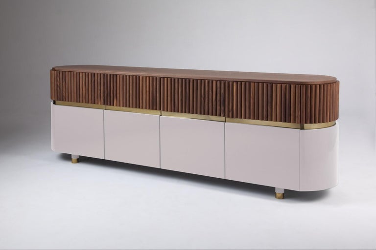 Berlin Contemporary sideboard by Dooq
Dimensions: W 250 x D 50 x H 78 cm
Materials: MDF, Marble, Natural Walnut Veneer, Stainless Steel Plated Polished Copper, Feet: Stainless Steel Plated Polished Copper

Metropolis Sideboard was created