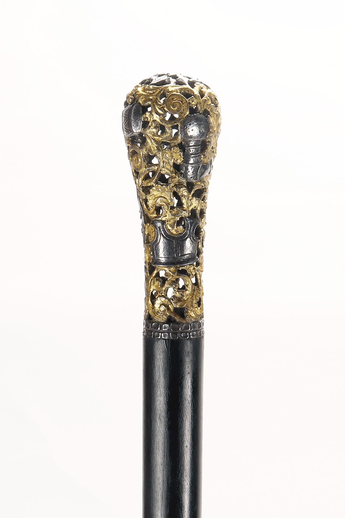 Bastón de hierro berlinés que representa partes de armaduras, Alemania, 1800. Metal en venta