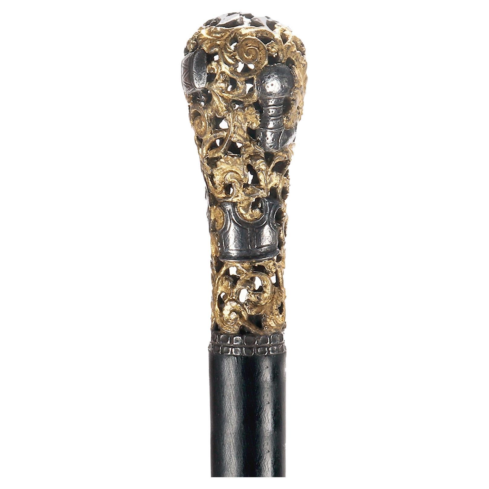 Stick de marche en fer de Berlin représentant des parties d'armures, Allemagne des années 1800.