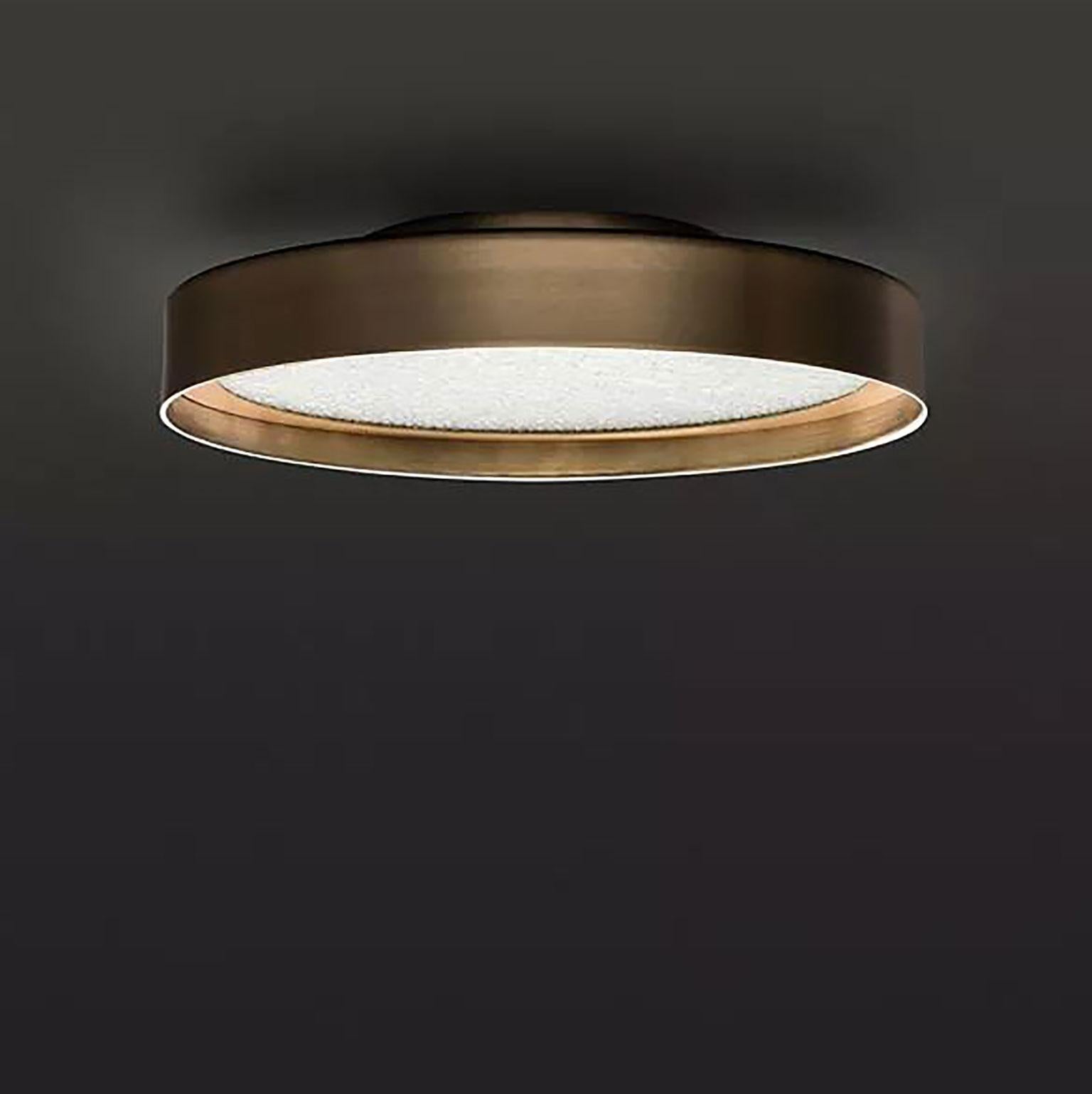 Berlin wall/ceiling lamp designed by Christophe Pillet for Oluce in 2017. Transparency of expression and the research for homogeneity are the key principles in the work of Christophe Pillet. The main feature of the lamp is the dual nature of usage.