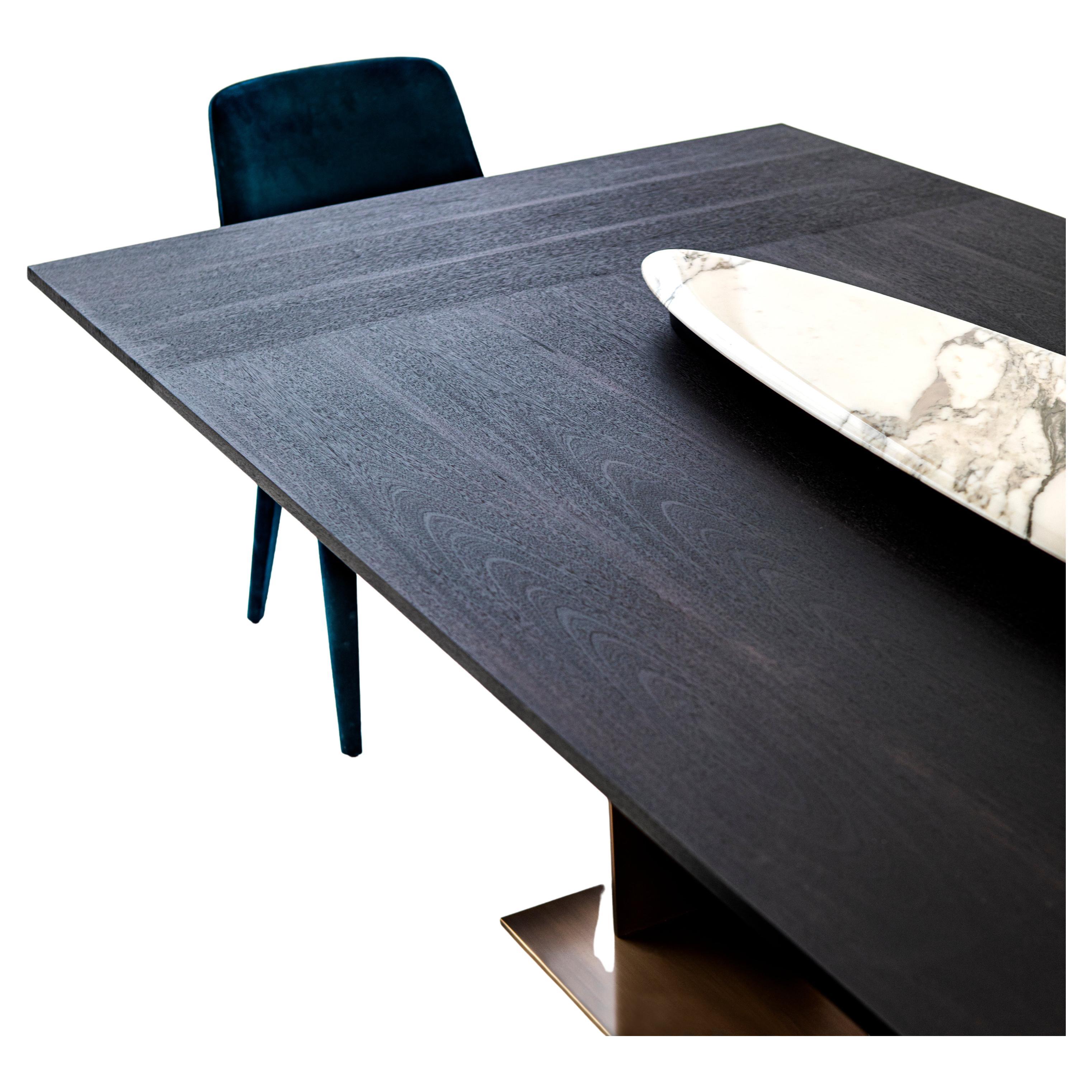 A family of tables inspired by the Modern Movement, in particular the formal rigour of Mies van der Rohe and the free compositions of Gerrit T. Rietveld, in the layout of the right-angled thin metal blades which make up the base.

The table top,