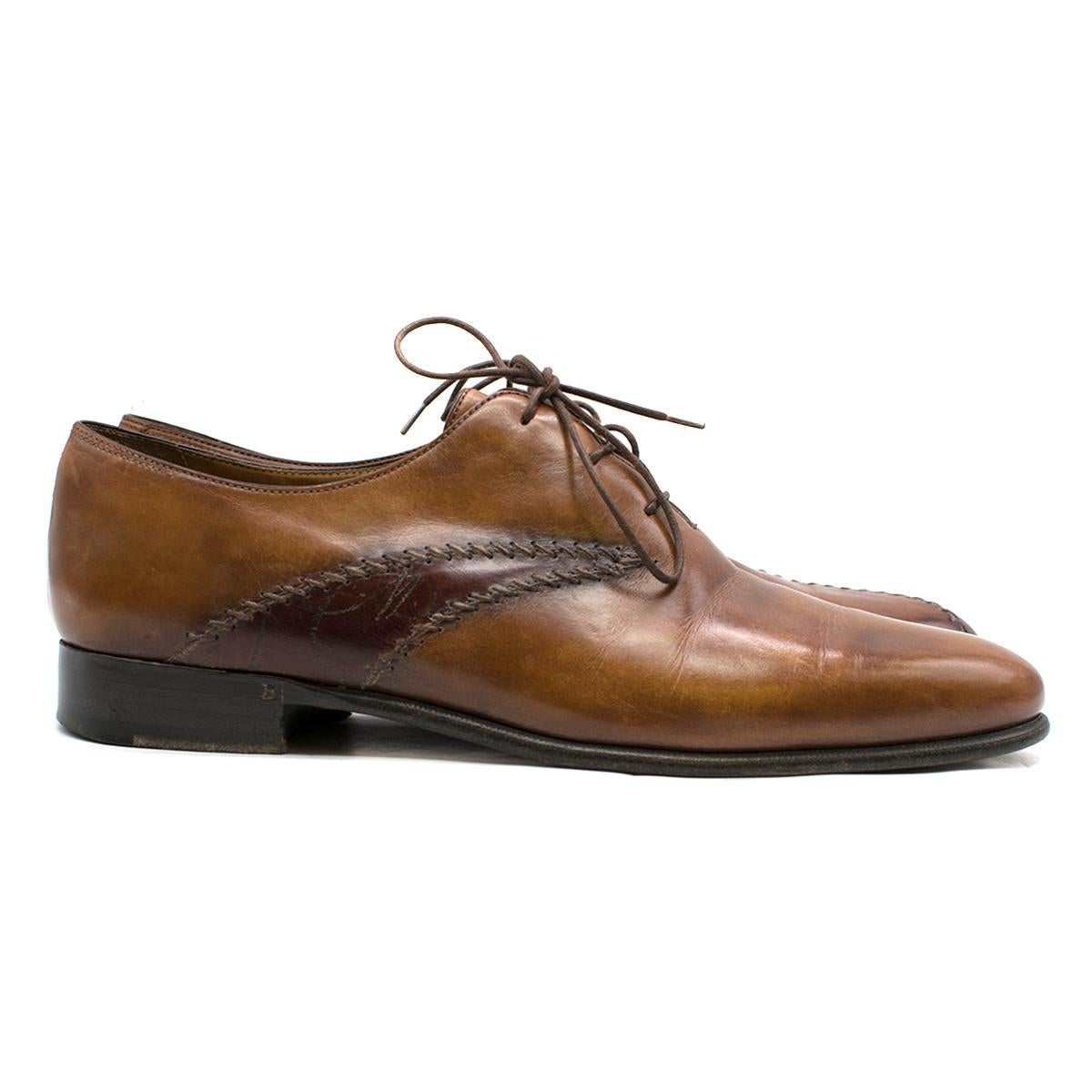 Berluti Brown Leather Derby Shoes

- Brown leather derby shoes
- Front lace up
- Round toe
- Stitching detailing
- Nude leather lining with logo embroidered
- Low heel
- This item comes with shoe trees and an alternative branded dust bag

Please