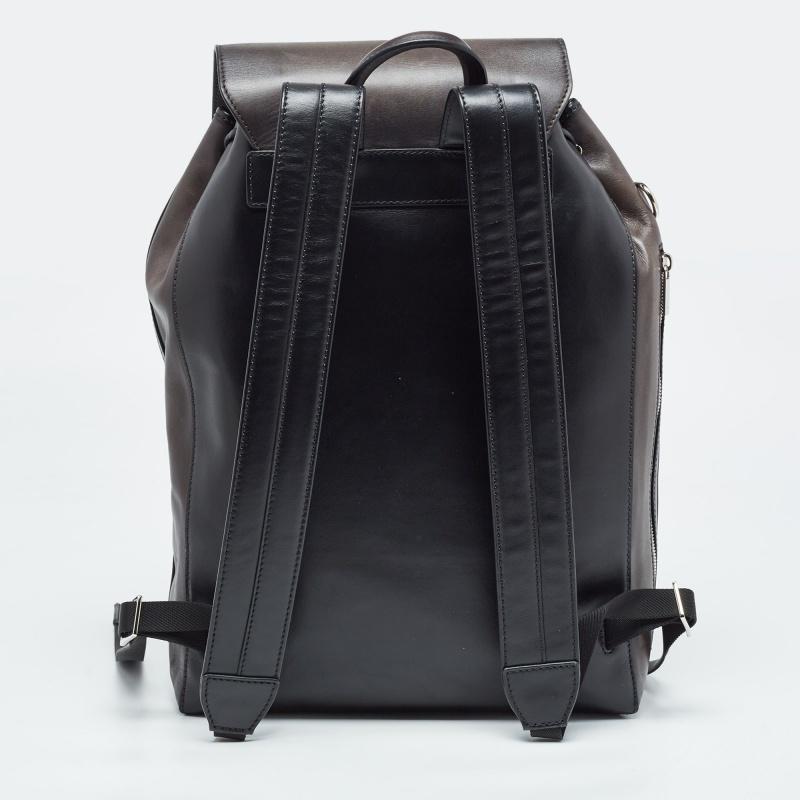 This practical and fashionable Berluti backpack will come in handy for daily use or as a style statement. It is smartly designed with a spacious interior for your belongings. Two shoulder straps make it ready to be yours.

