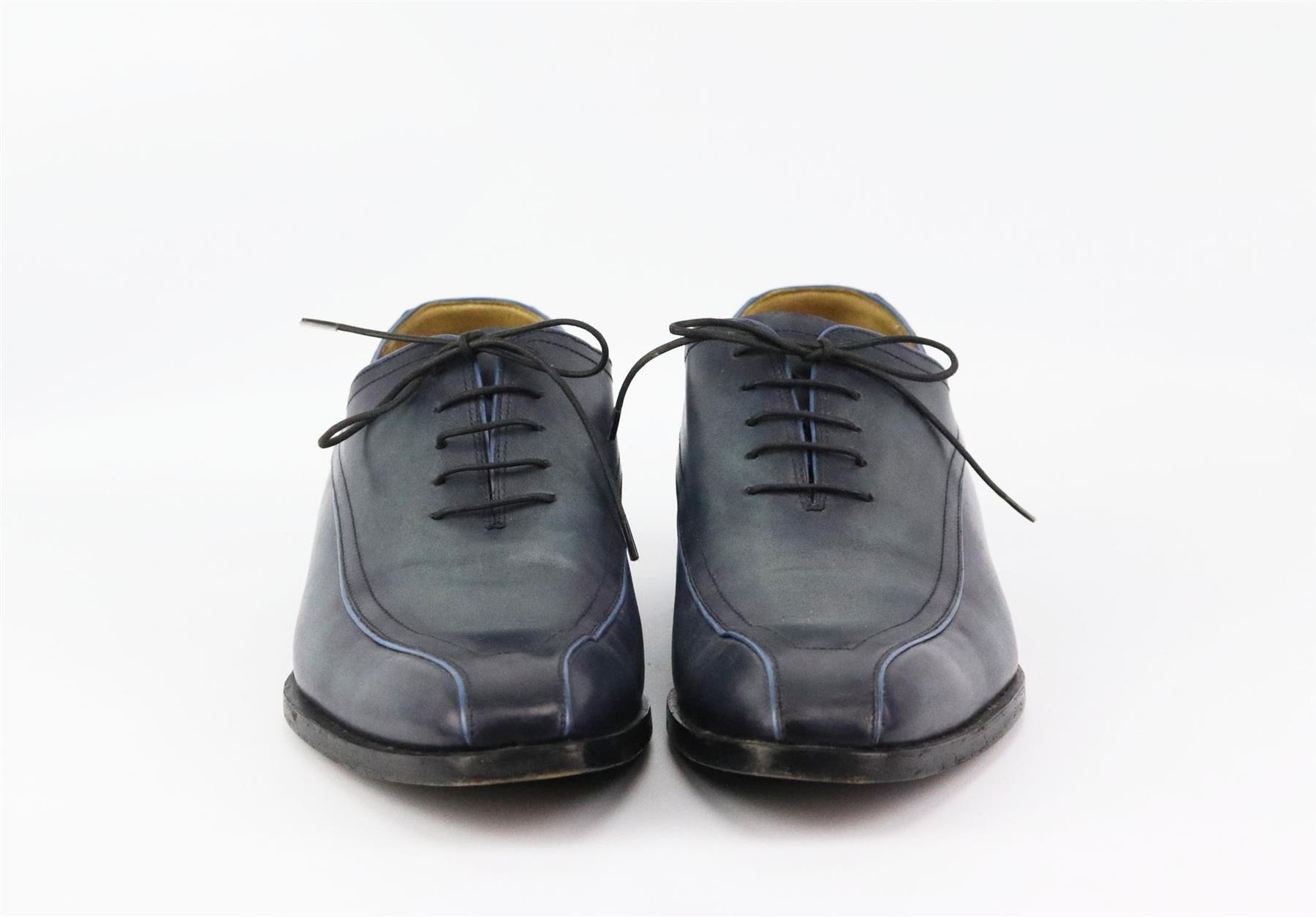 These men’s oxford shoes by Berluti are a modern update to the classic loafer, these lace-up shoes come in sleek intentionally faded navy leather with  wooden soles. Heel measures approximately 25mm/ 1 inch. Navy leather. Lace-up fastening at front.