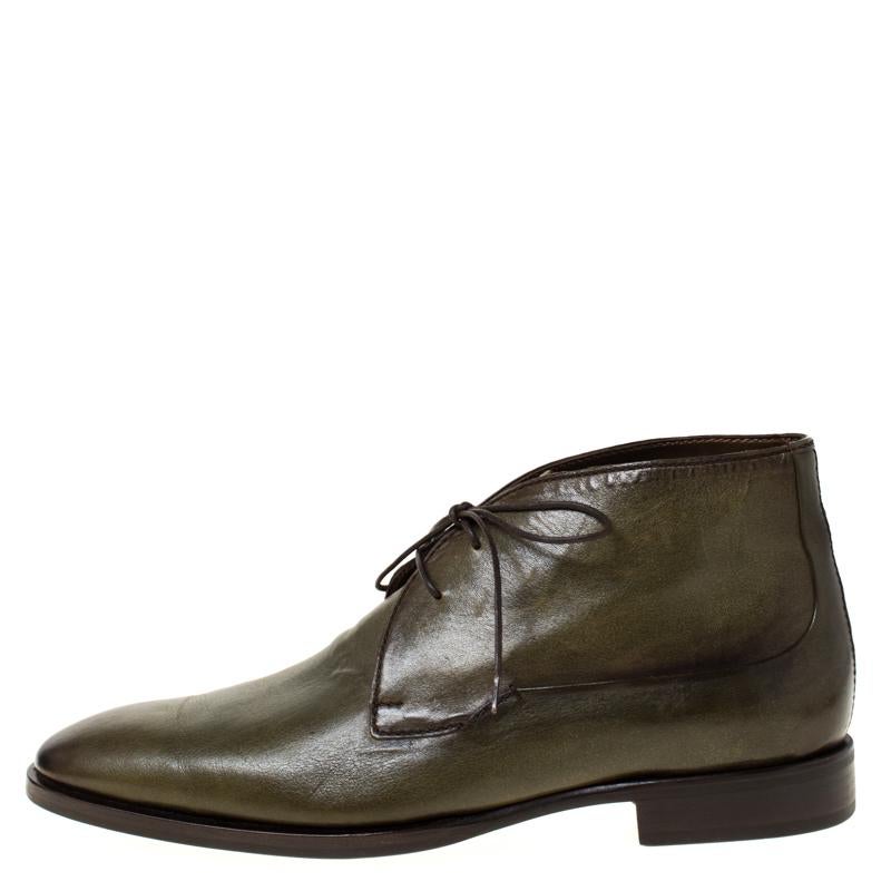 Expertly crafted from leather, these olive green boots from Berluti are simple and stylish. They bring comfort and easy style through their shape and shade. The boots feature round toes, lace-ups and tough soles for longer use.

Includes: Original