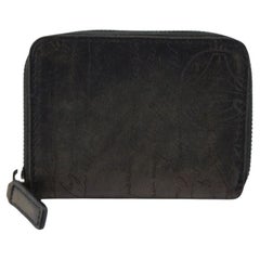 Berluti Round Compact wallet features black Wapa leather with Berluti's