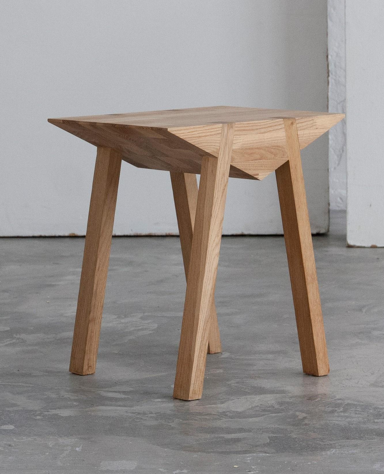 Lunae stool by Katryna Sadauskaite
Dimensions: 30 x 37 x 42 cm
Materials: Ash wood

This elegant stool was inspired by an old wood sawing technique on a trestle. In the process, the design changed and the object was shaped in a triangle while