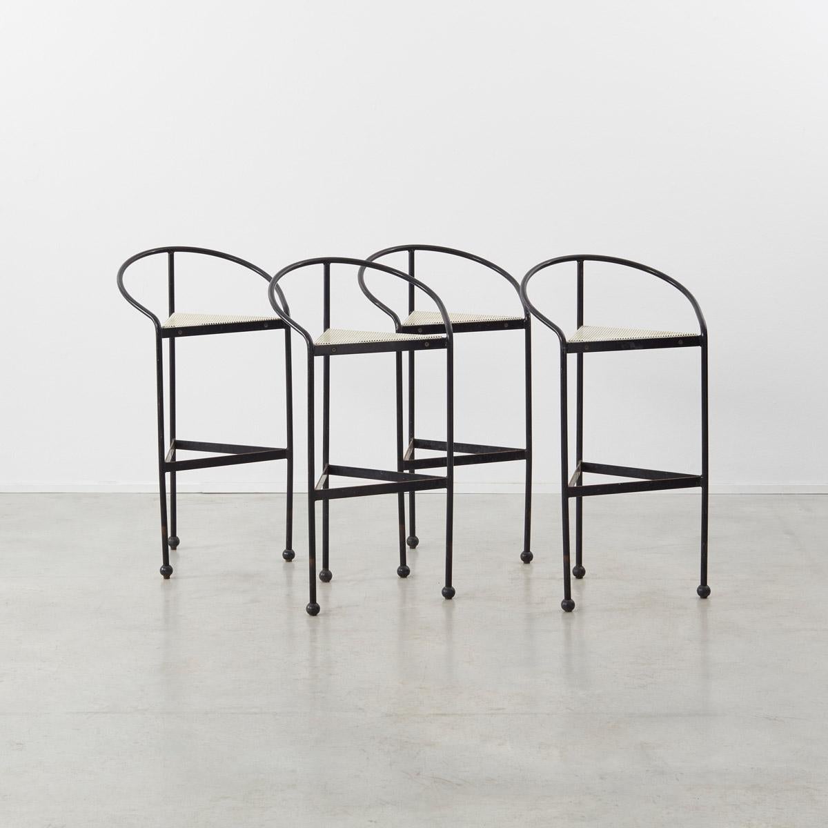 Beautiful perforated metal stools made in Spain circa 1970 by C. Miret. Four available. While entirely original, there is a small nod to others working in steel rod and perforations: Mathieu Matégot and Mario Botta. These were of a small quality