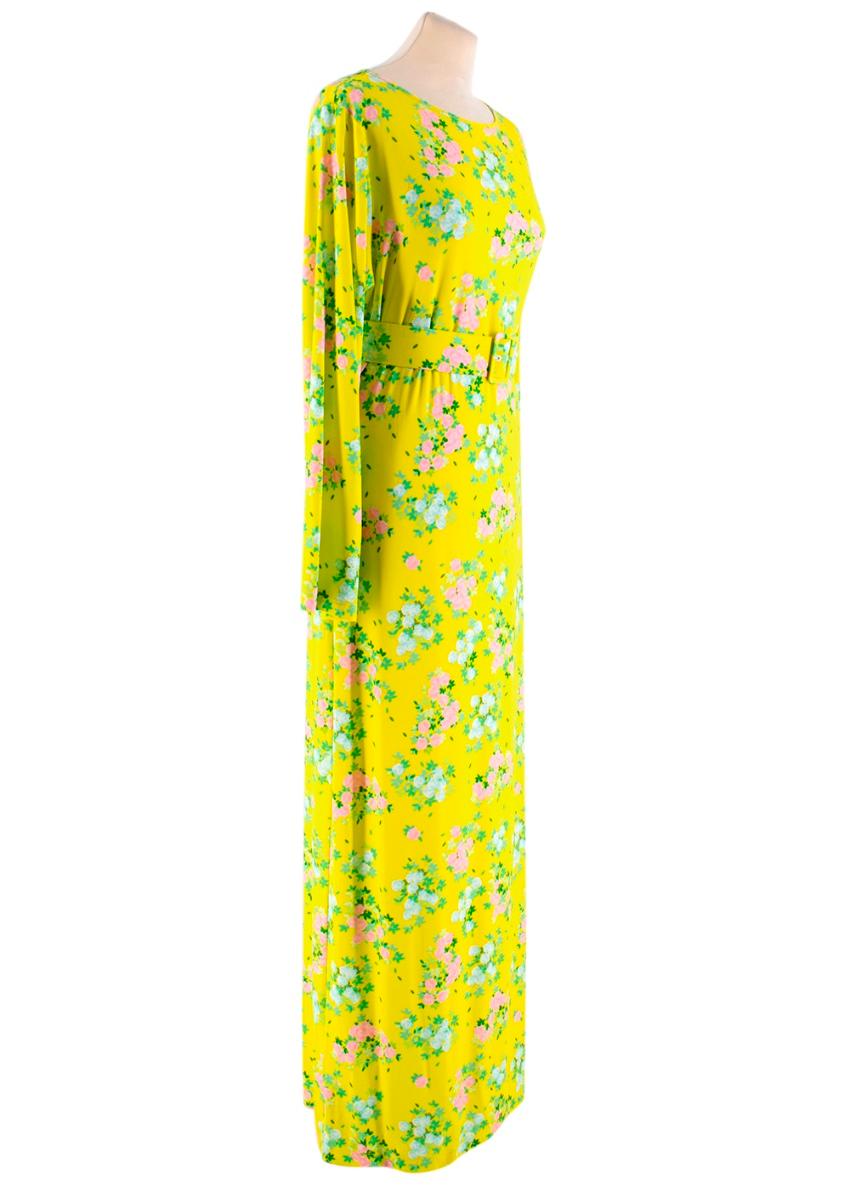 Bernadette - Yellow Monica Floral Print Maxi Dress

- Close, Slim Fit - Long sleeve - Belted at the waist with a buckle fastening - floral print - fluted sleeves - boat neckline - stretch fabric - 90% Viscose, 10% Elastane

- Made in Belgium - dry