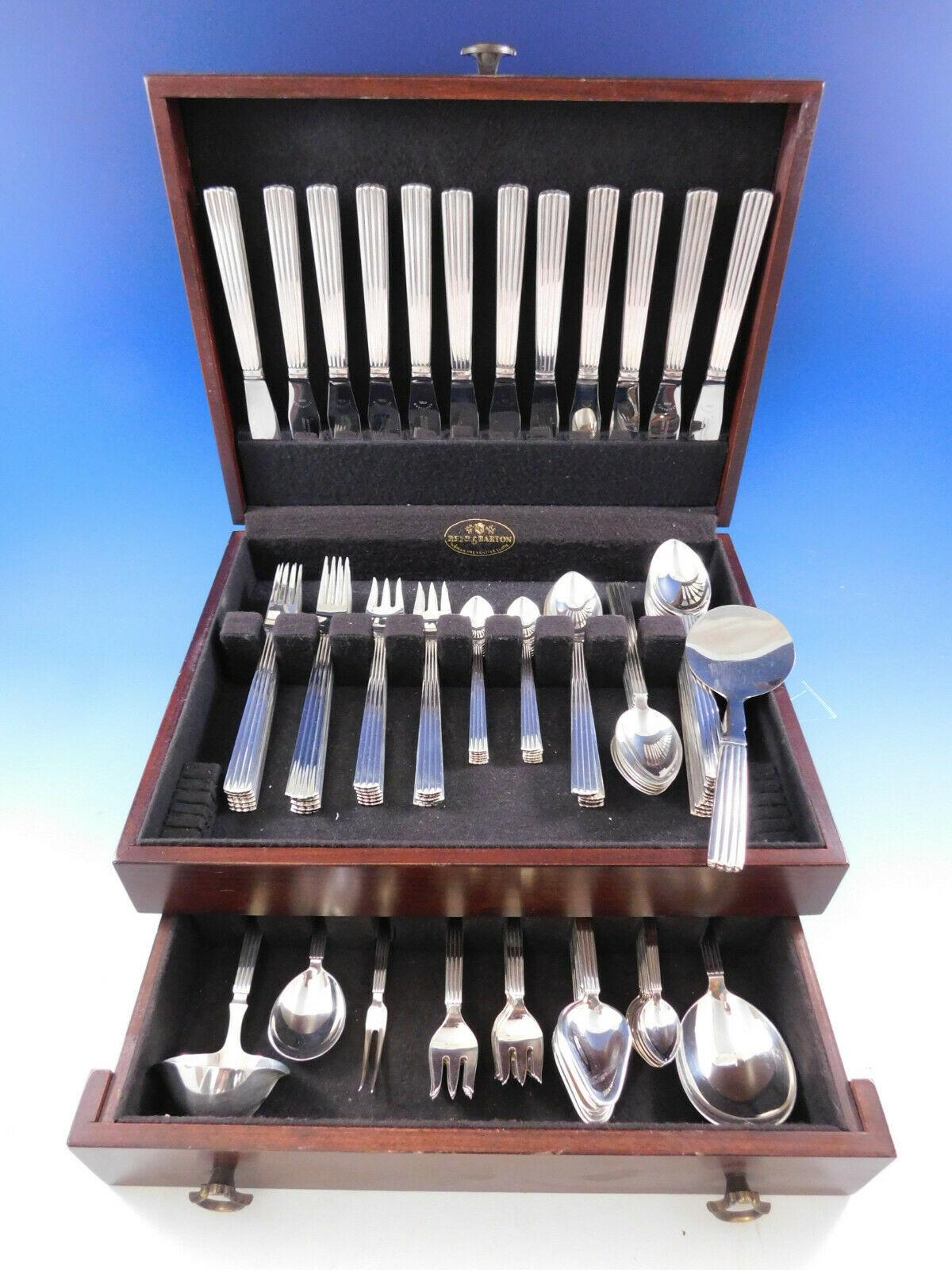 Exceptional dinner size Bernadotte by Georg Jensen Sterling silver flatware set, 113 pieces.This set includes:

12 dinner knives, long handle, 8 3/4
