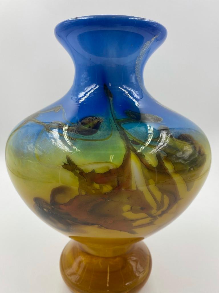 Beautiful glass vase in diverse colors and in excellent condition documented and signed by Bernard Aconito for Biot.
Unique art glass vase. Late 20th century modernist vase. Cased layers of multi-colors in a stunning pattern.
Very good or