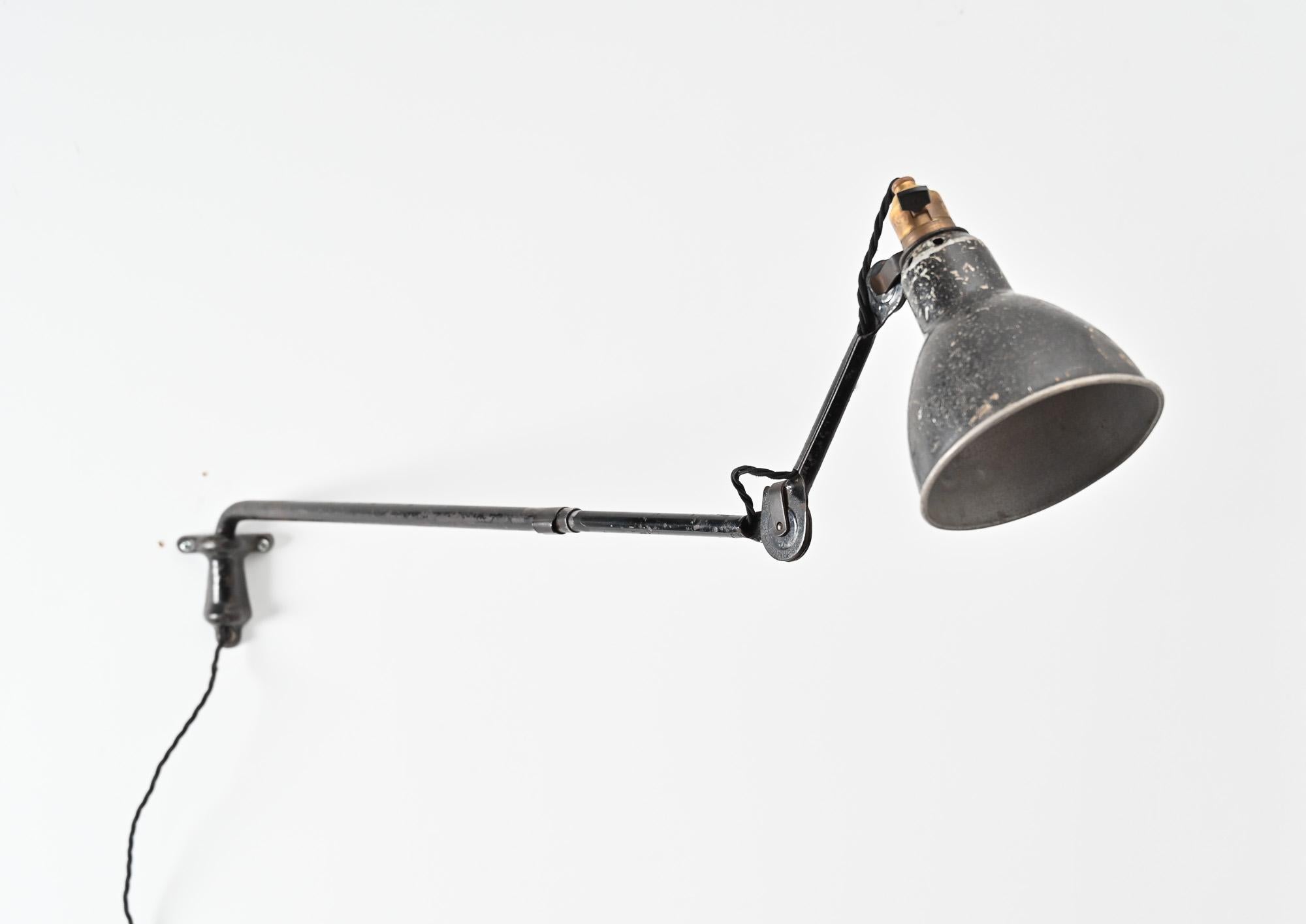 20th Century Bernard Albin Gras 203 model adjustable wall lamp For Sale