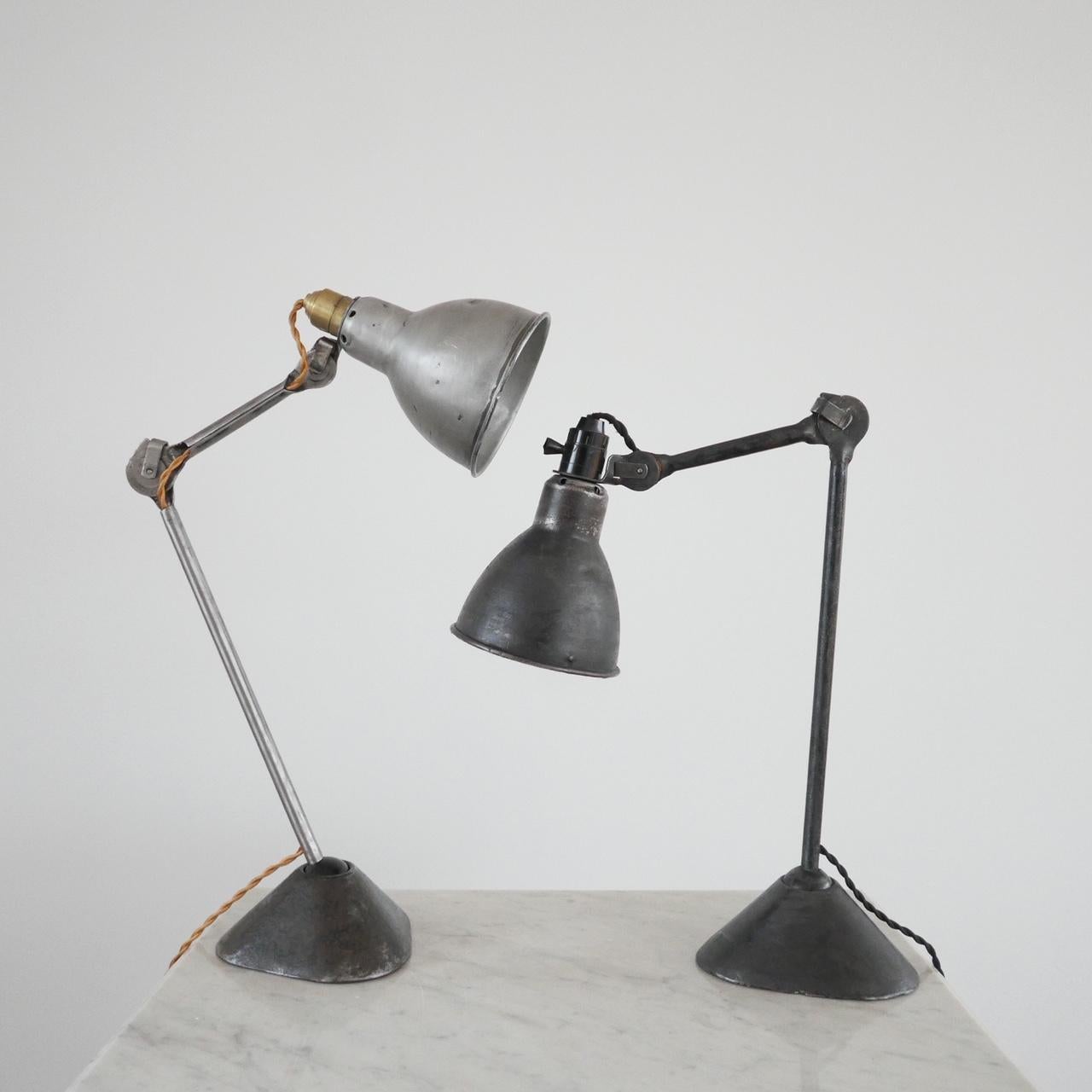 Early to mid-20th century French table lamp by Bernard-Albin Gras.

Rare model 205 with triangular base. 

Adjustable in many places.

Re-wired to UK standards with black silk flex. 

The middle to arms are not as stiff as they should be so