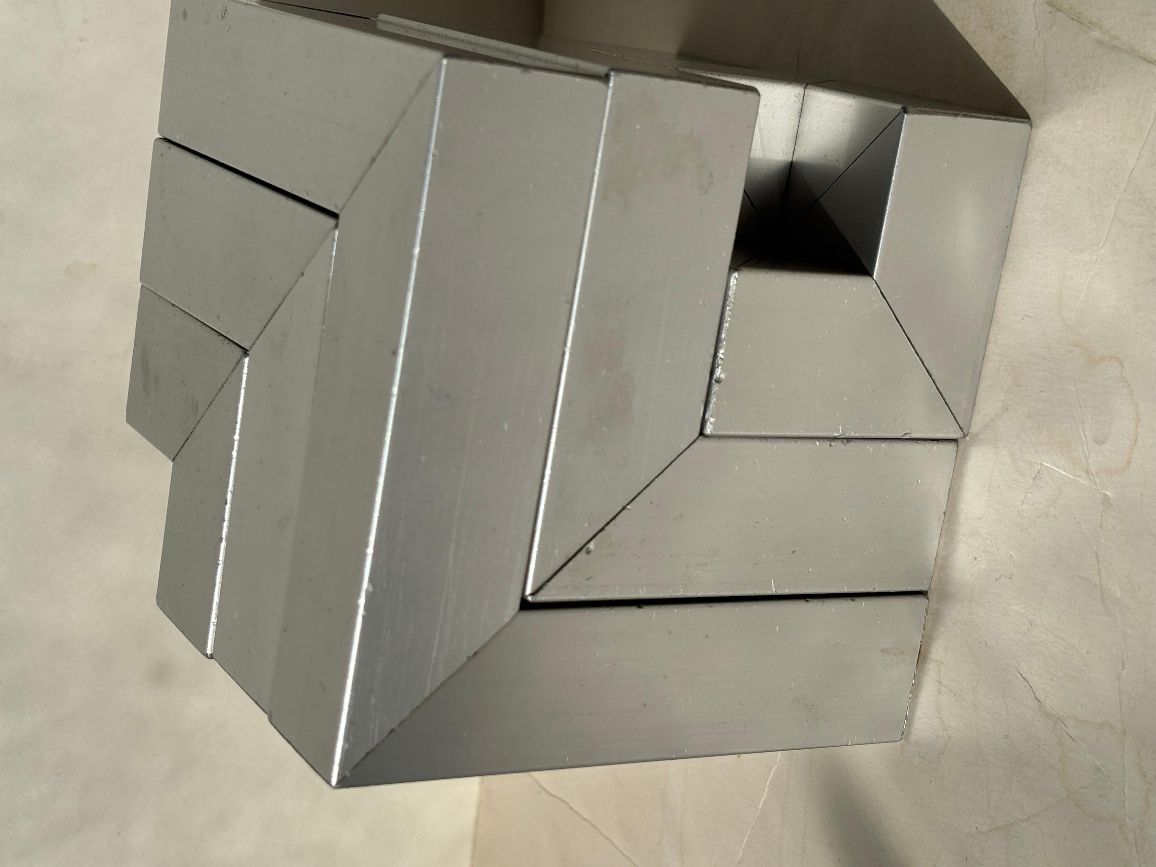Alluminio Bernard Girette puzzle in alluminio scultura astratta, titolo  Le Pentac . in vendita