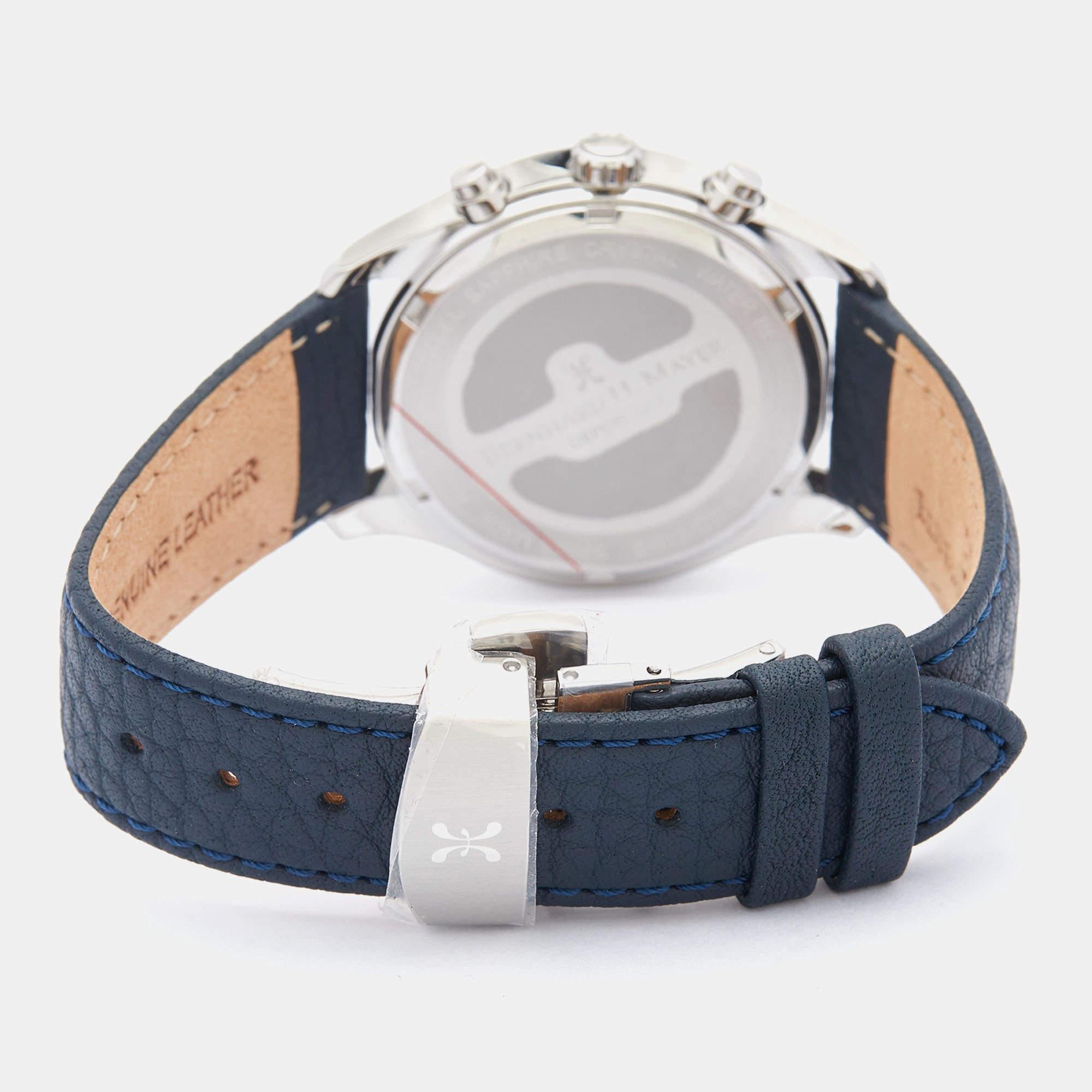The Bernard H. Mayer Iris is a stylish and versatile unisex wristwatch. It features a stainless steel case with a leather strap, offering a sophisticated look. The watch showcases a blue hue on the dial, adding a unique touch. With its reliable