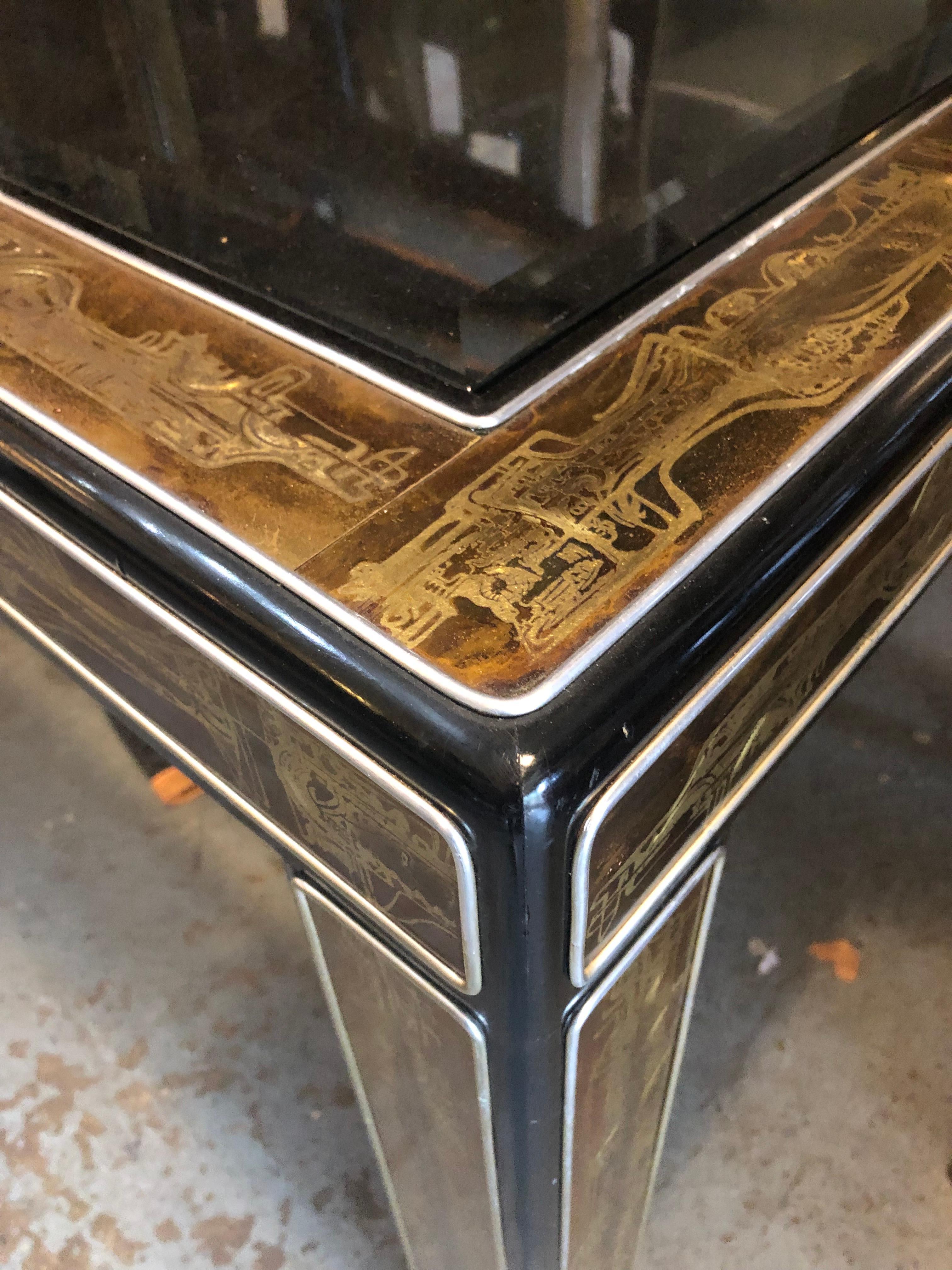Stunning dining table with etched brass detailing. Table is 71