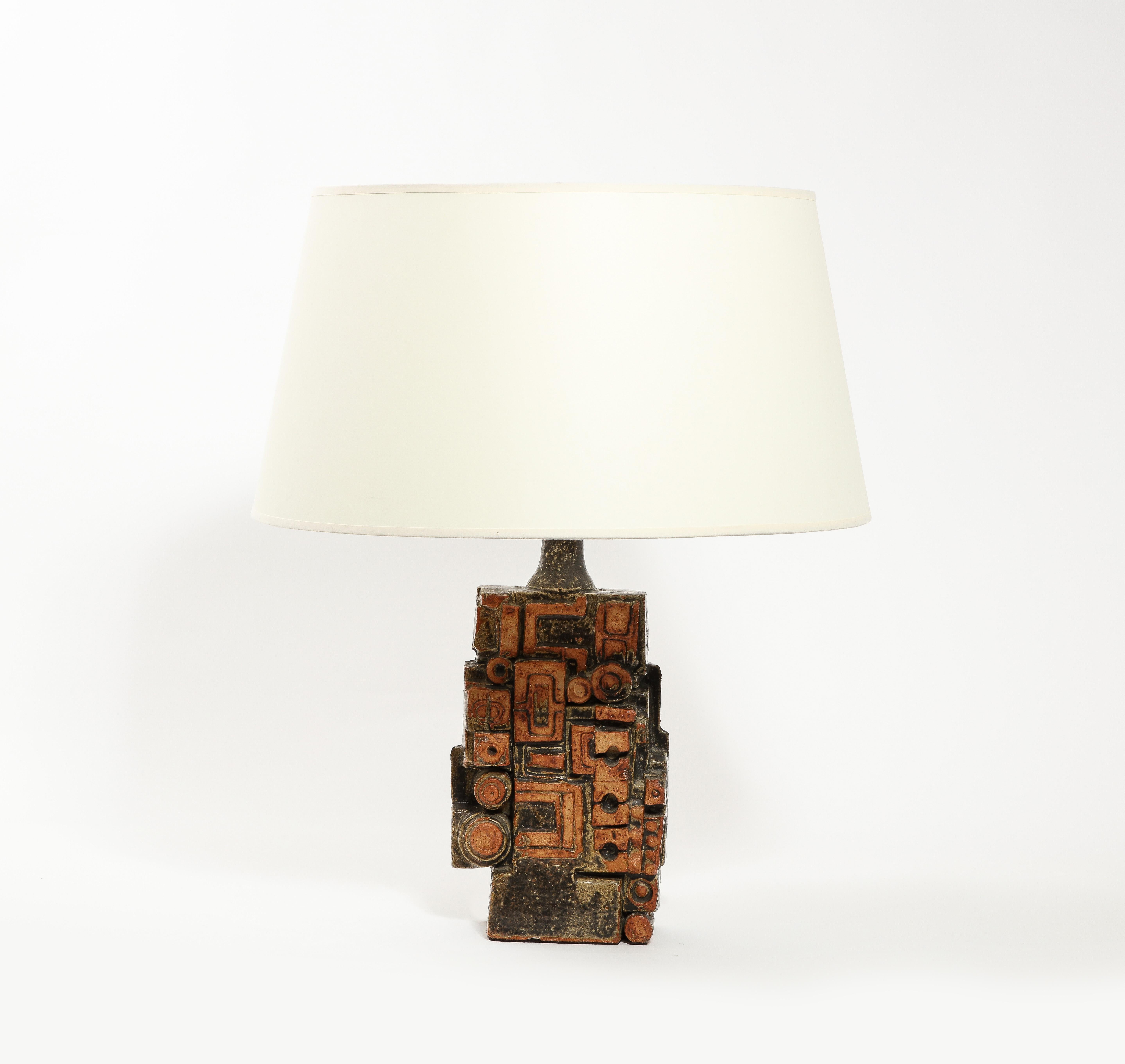 Brutalist table lamp by Bernard Rooke in a Mayan pattern with a textured finish and a nuanced green and ochre glaze. Size of the base only. No shade included.