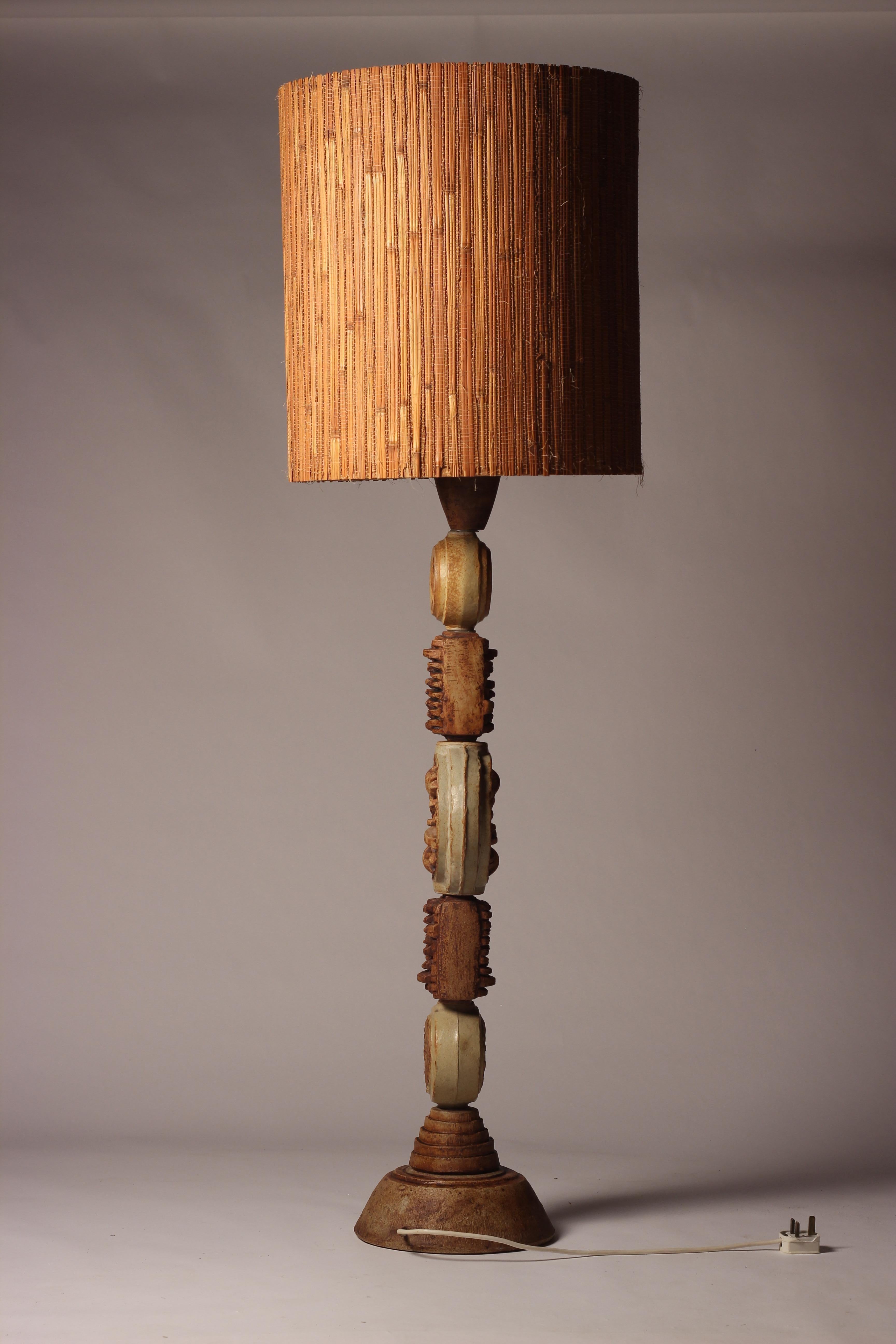 A Bernard Rooke Totem floor lamp ht 106 cm x dia at base 27cm ht including original shade 151cm 
Shade dia 46cm x 50.6 ht

This light is easily unassembled for cost affective shipping. We can also rewire for all regions.
 
A heavy ceramic TOTEM