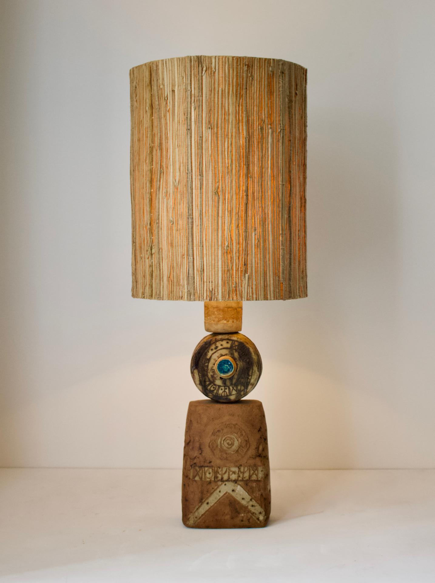 A single large, or oversize, ceramic TOTEM table lamp by Bernard Rooke, England, 1960s.

Sculptural piece, made of hand-formed ceramic elements in natural tones of terracotta, with a combination of dry and glazed finishes. The lamp is made up of