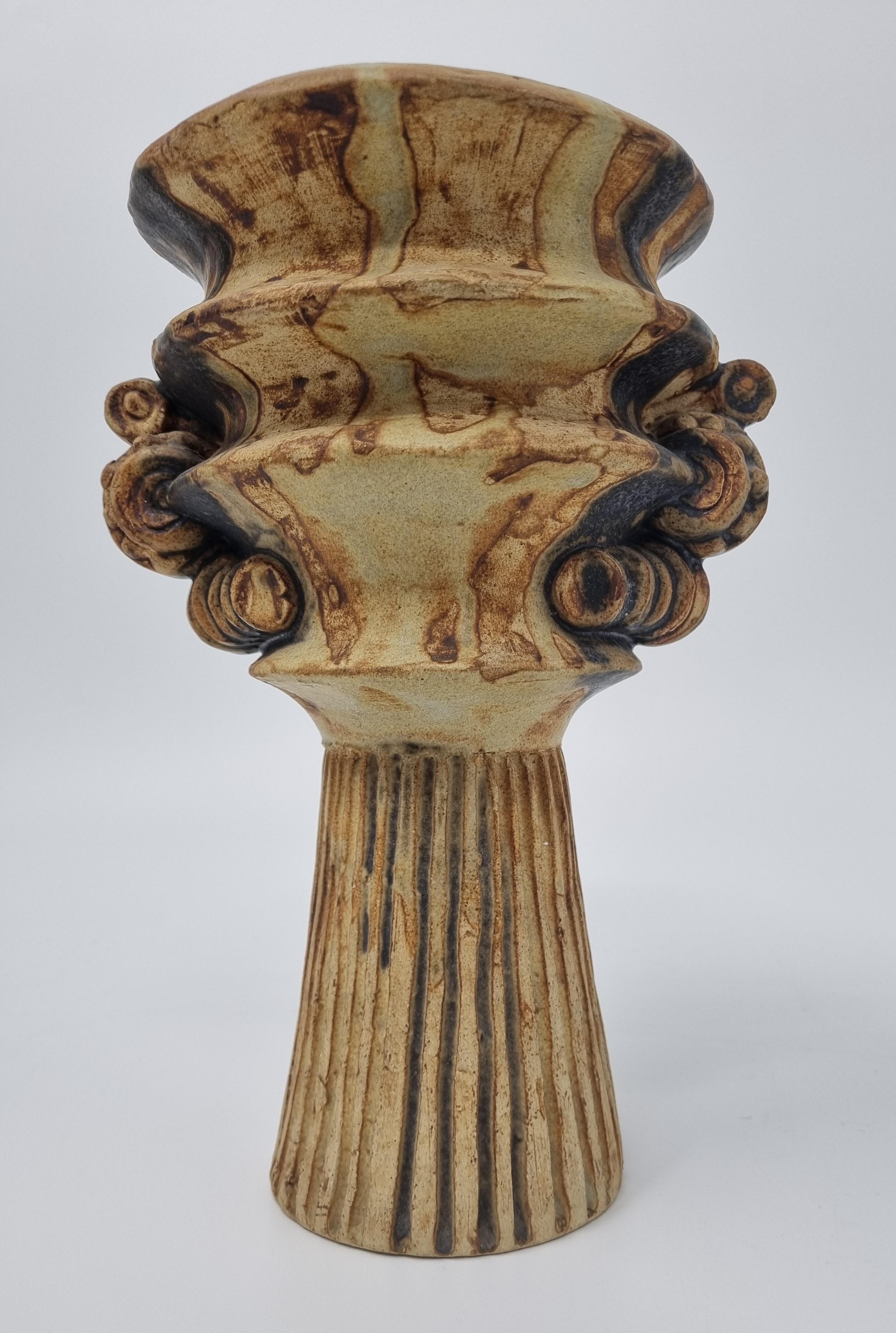 Bernard Rooke Studio Pottery Chalice is a rare vintage example from the 1960s. Made by the renowned British artist and potter, Bernard Rooke, this piece is a true testament to his artistic brilliance and mastery of the medium.

Bernard Rooke's