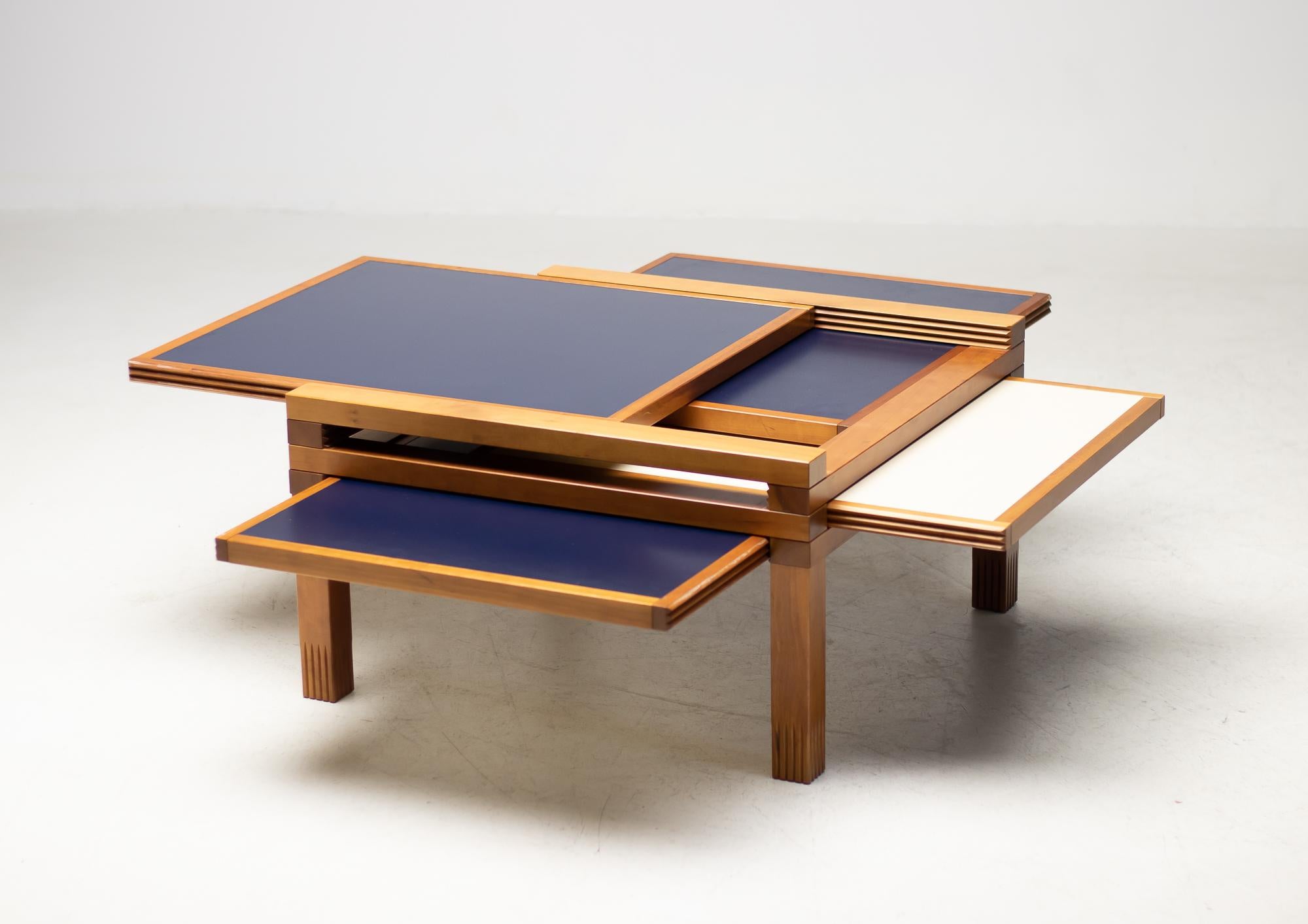 Versatile Bernard Vuarnesson “Hexa” coffee table for Bellato Italy. 
The table is made from iroko wood with reversible dark blue and white laminated extendable tops. 

Measurements: D 70 cm, L 70 cm, H 40 cm.
Extended: L 185 cm.