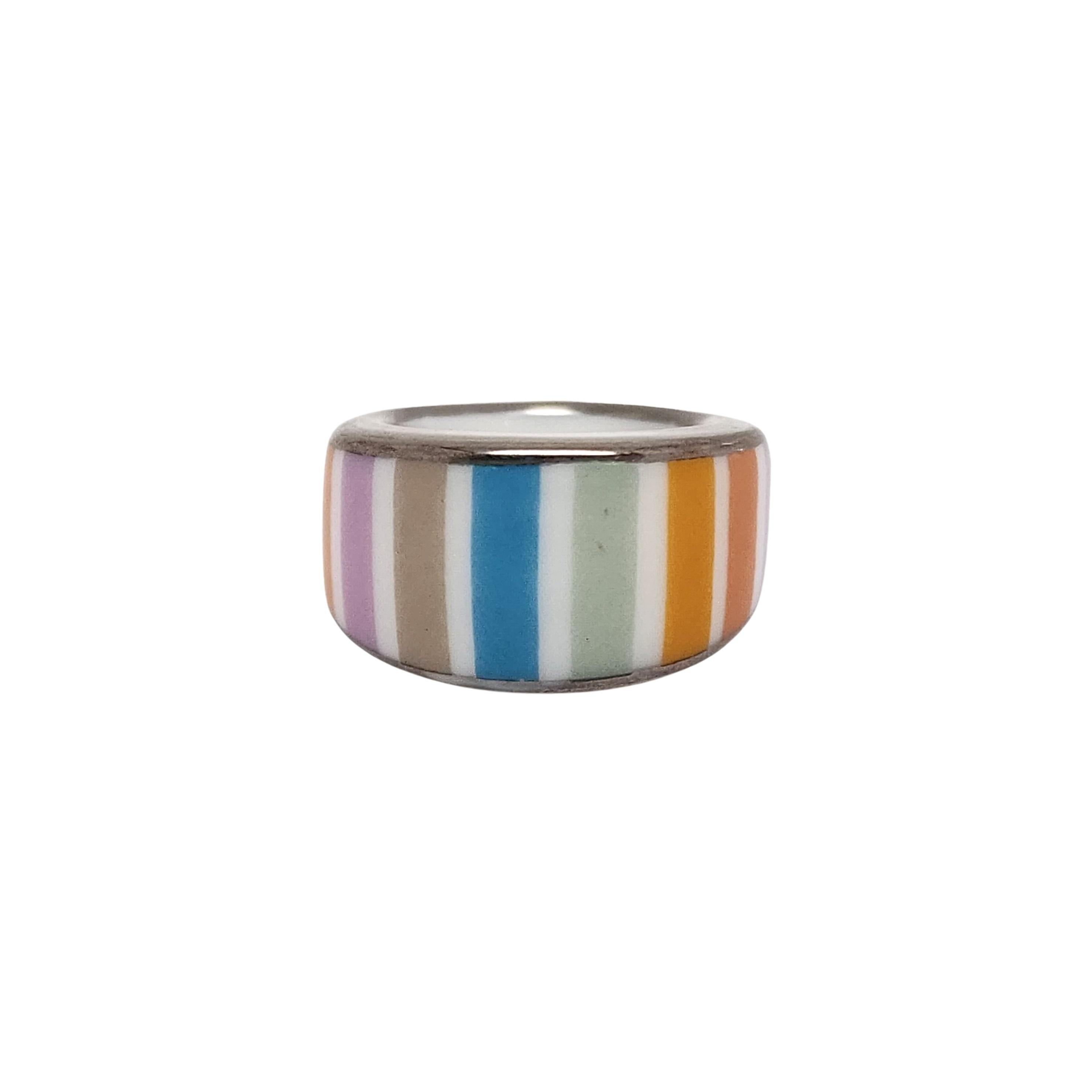 Silver and porcelain with enamel ring by Bernardaud of Paris.

Size 6.5

Beautiful ring featuring multi color enamel striped porcelain.

Measures approx 13.5 wide at front (approx 3/8