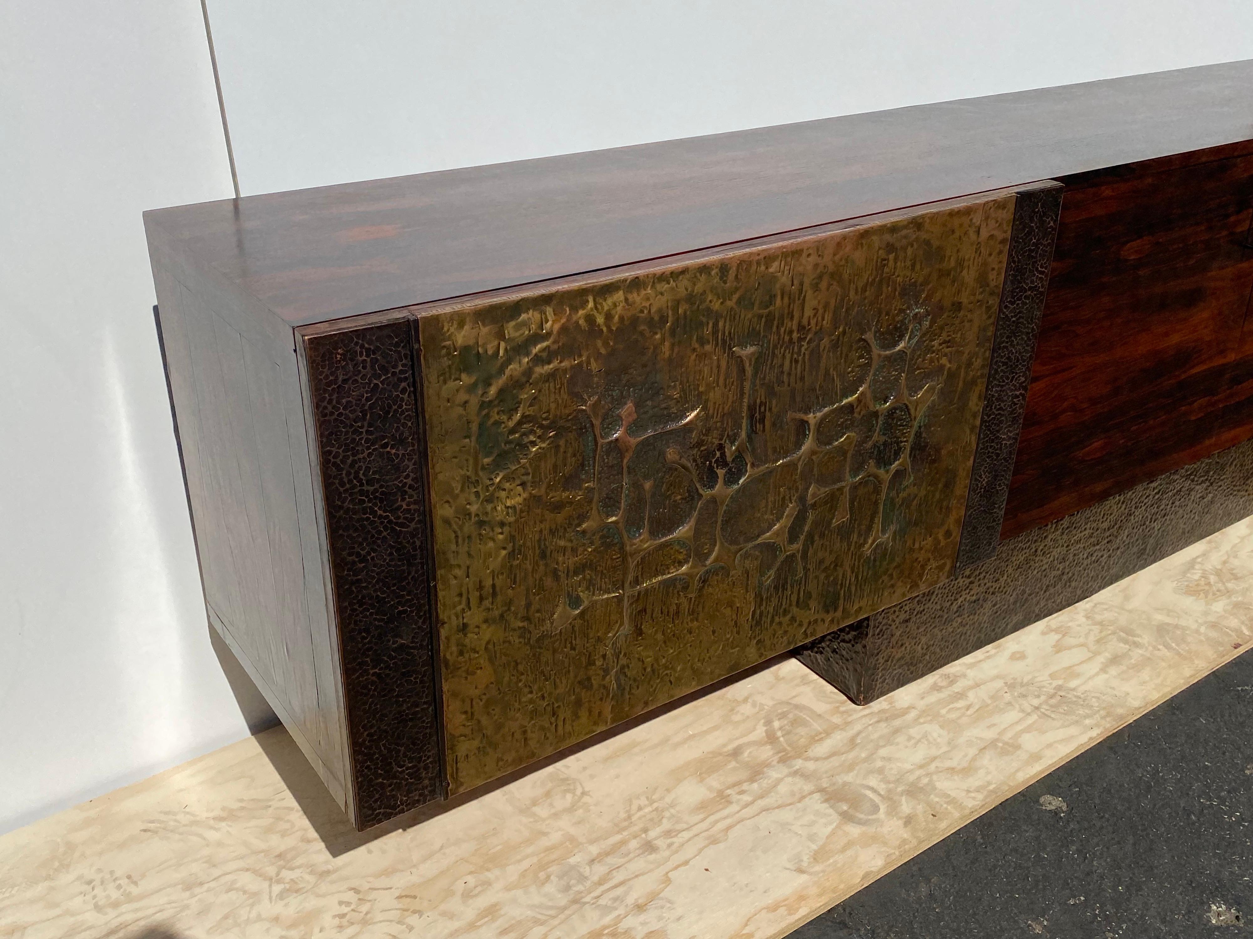 Custom made Bernardo Figueiredo and Sergio Rodrigues massive rosewood credenza/ sideboard with brutalist details. Bernardo and Sergio sometimes collaborated for custom projects on creating one of a kind pieces for one of a kind mid century modern