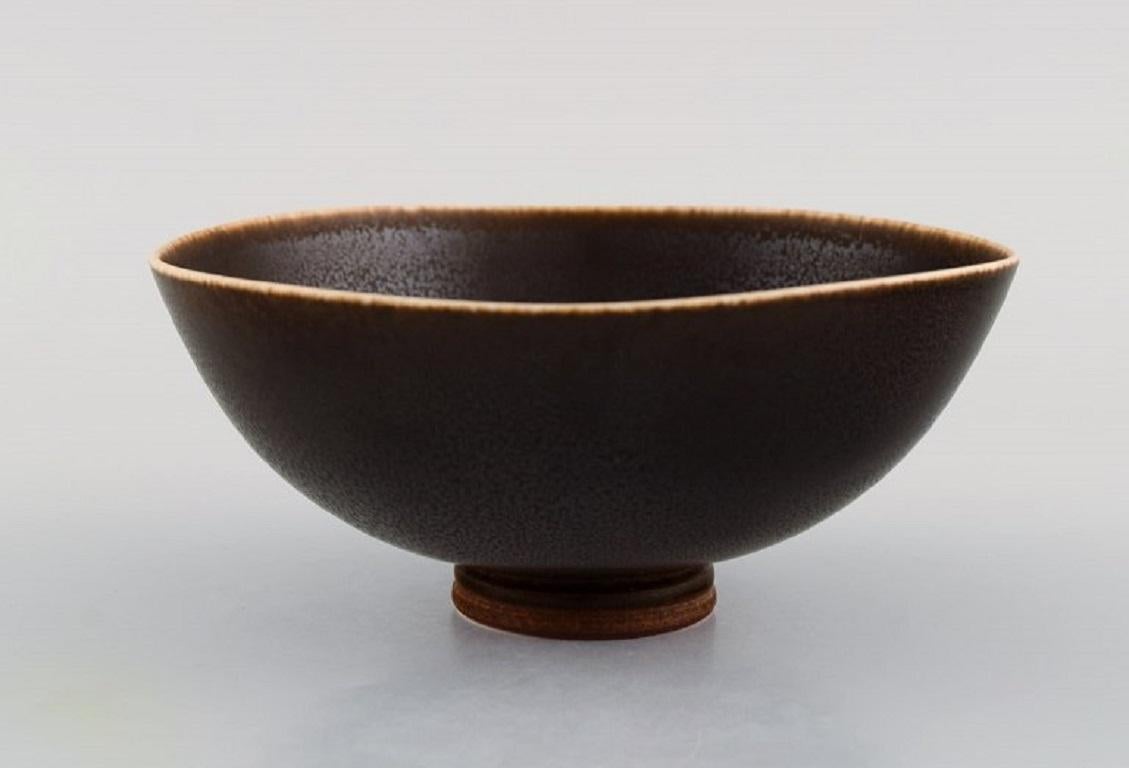 Berndt Friberg (1899-1981) for Gustavsberg Studio. Bowl on foot in glazed stoneware. 
Beautiful glaze in brown shades. Dated 1968.
Measures: 13.5 x 6 cm.
In excellent condition.
Signed.