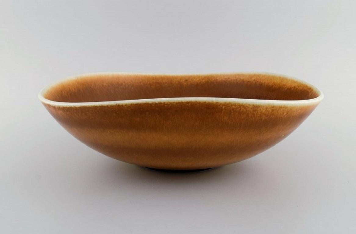 Berndt Friberg (1899-1981) for Gustavsberg Studio. 
Large bowl in glazed ceramics. Beautiful glaze in shades of brown. Dated 1966.
Measures: 32 x 10 cm.
In excellent condition.
Signed.