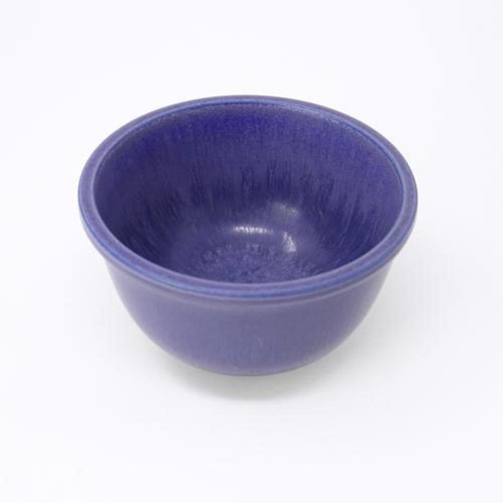 A very early violet-blue bowl with a haresfur glaze by Berndt Friberg for Gustavsberg. This is signed on the base with a monogram and has the Gustavsberg marks for 1940-44 and the word Ankargods (anchor ware). These marks were only used on the very