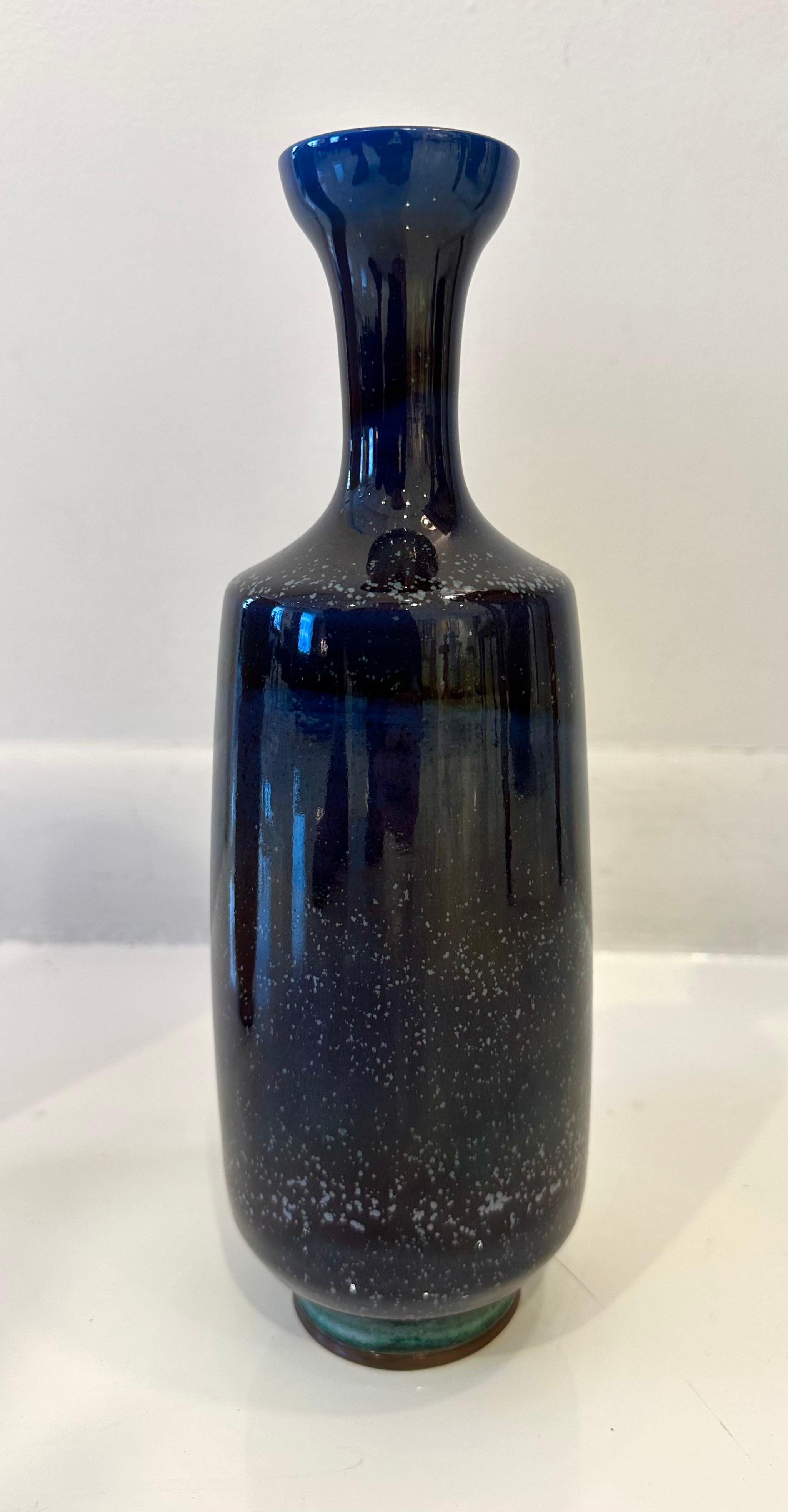 Unique hand-thrown and glazed blue bottle vase. Letter dated 1963, with incised Gustavsberg Studio hand and signed 