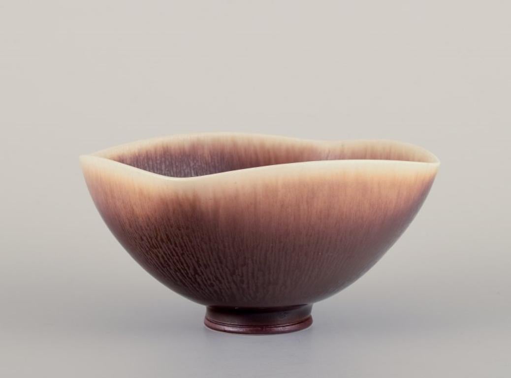 Berndt Friberg (1899-1981) for Gustavsberg Studio, Sweden. 
Unique ceramic bowl with brown-toned glaze.
Mid-20th century.
Signed.
Perfect condition.
Dimensions: D 11.5 cm x H 5.8 cm.

Berndt Friberg is widely recognized as one of the prominent