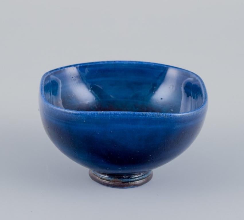 Berndt Friberg (1899-1981) for Gustavsberg, Sweden.
Unique miniature ceramic bowl with blue glaze.
Signed and dated '59.
Perfect condition.
Dimensions: D 4.5 cm x H 2.7 cm.

Berndt Friberg is widely recognized as one of the prominent figures in