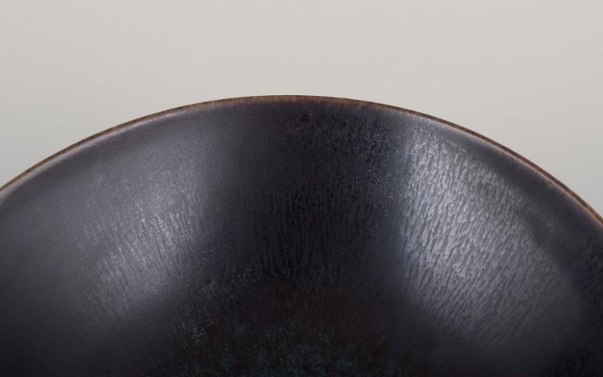 Swedish Berndt Friberg, Gustavsberg Studio. Ceramic bowl with glaze in blue-green tones For Sale
