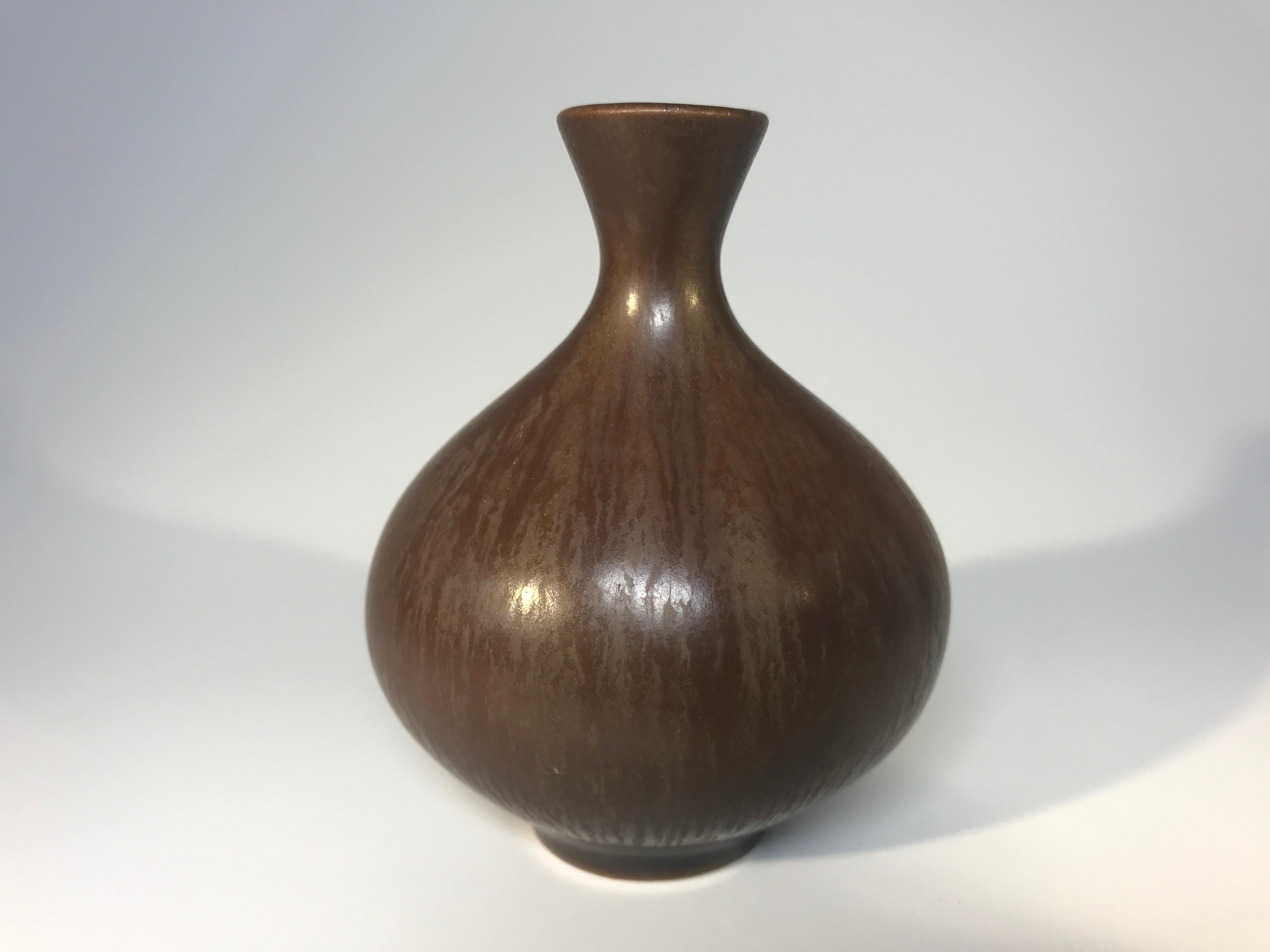 Signature Hares Fur glaze hand thrown miniature vase, attributed to Berndt Friberg for Gustavsberg, Sweden
Applied by hand, the glaze is often layered to achieve structure and depth
Berndt Friberg was influenced by Japanese and Chinese art -
