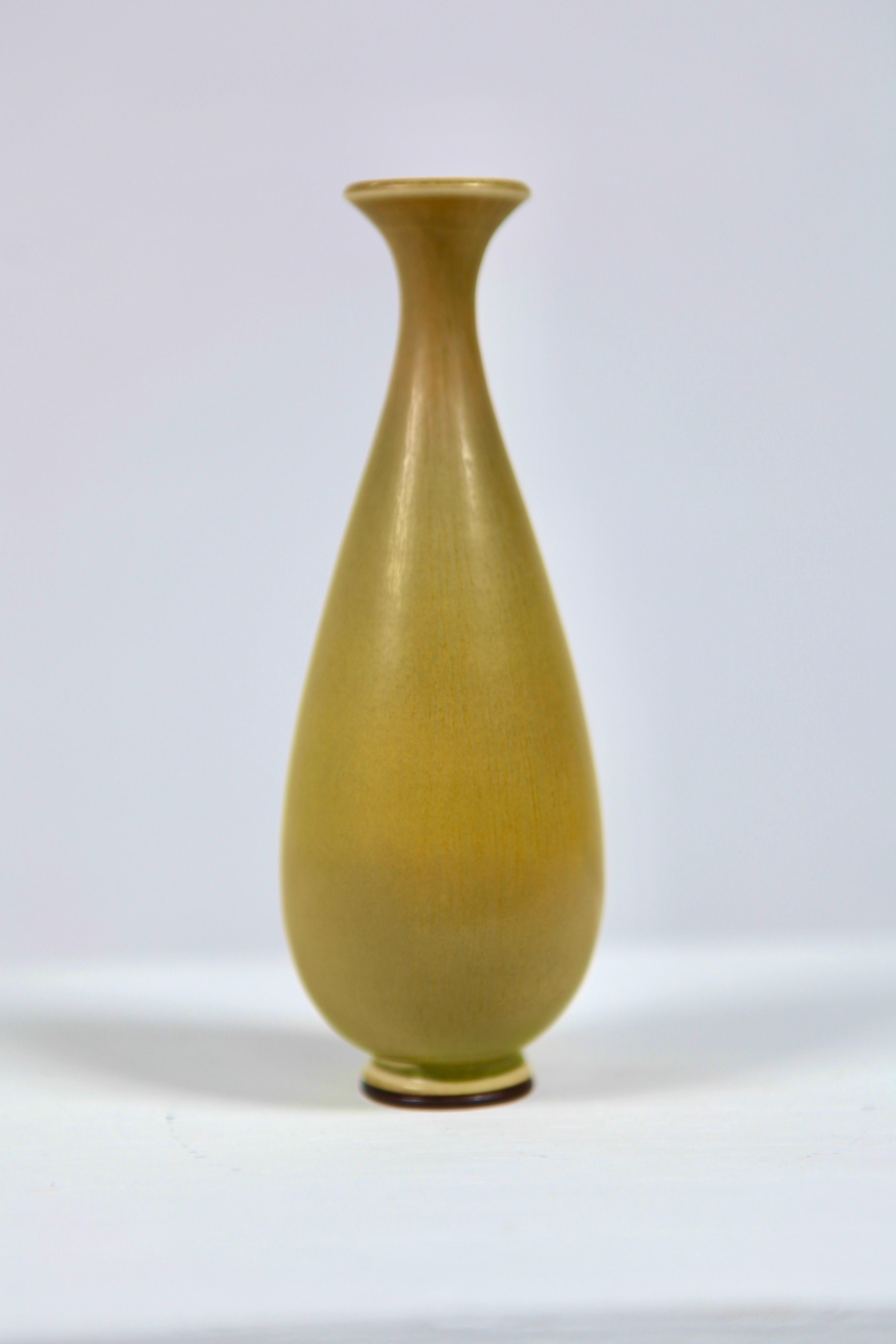 Berndt Friberg, Gustavsberg Studio hand signed yellow haresfur glazed vase.
Excellent condition.