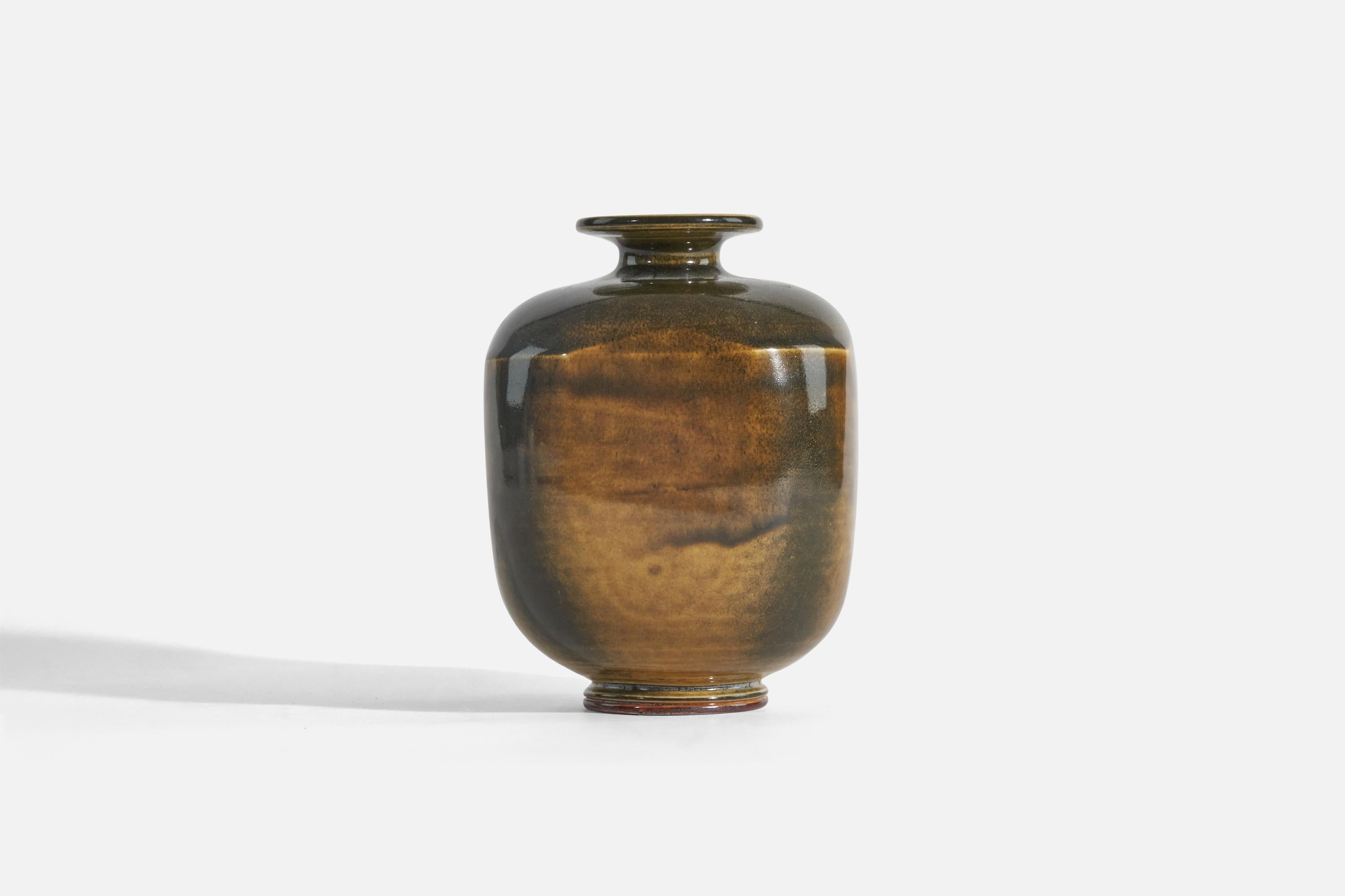 A black and brown-glazed stoneware vase designed by Berndt Friberg and produced by Gustavsberg, Sweden, 1976.


