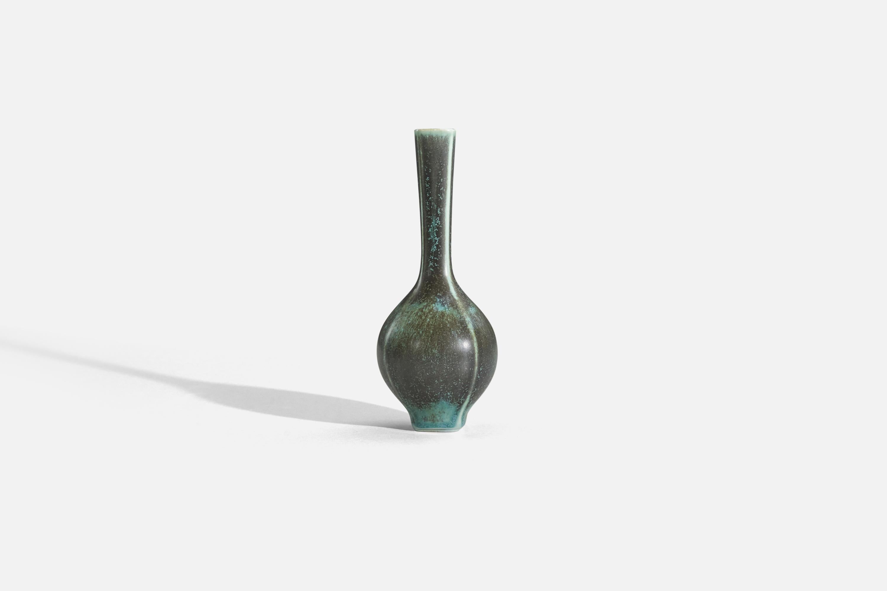 A green, glazed stoneware vase designed and produced by Berndt Friberg, Gustavsberg, Sweden, 1960s.
   